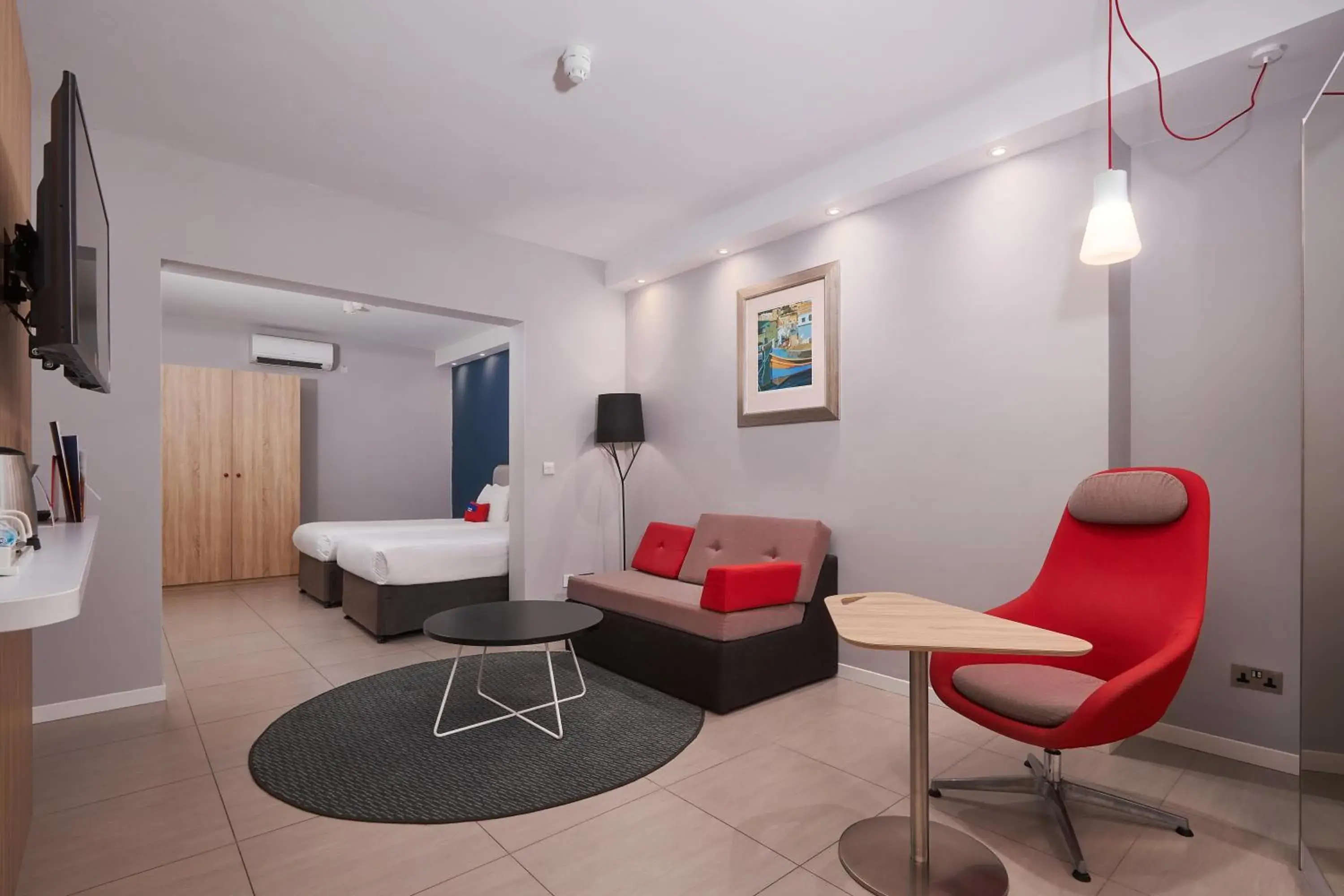 Twin Suite with Two Twin Beds, Sofa Bed and Pool Access in Holiday Inn Express - Malta by IHG Twin Suite with Two Twin Beds, Sofa Bed and Pool Access in Holiday Inn Express - Malta by IHG