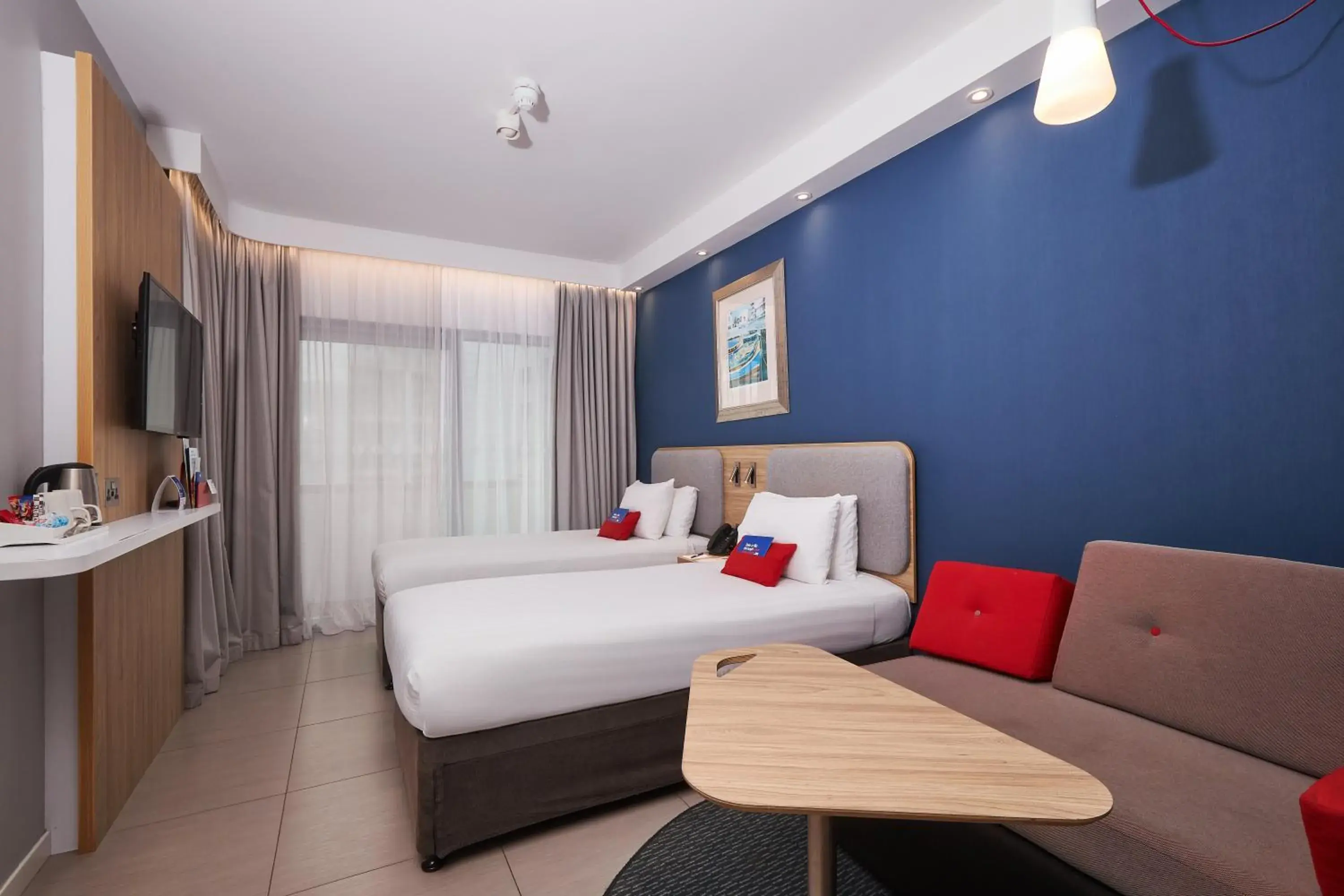 Standard Twin Room with Two Twin Beds, Sofa Bed and Balcony in Holiday Inn Express - Malta by IHG Standard Twin Room with Two Twin Beds, Sofa Bed and Balcony in Holiday Inn Express - Malta by IHG