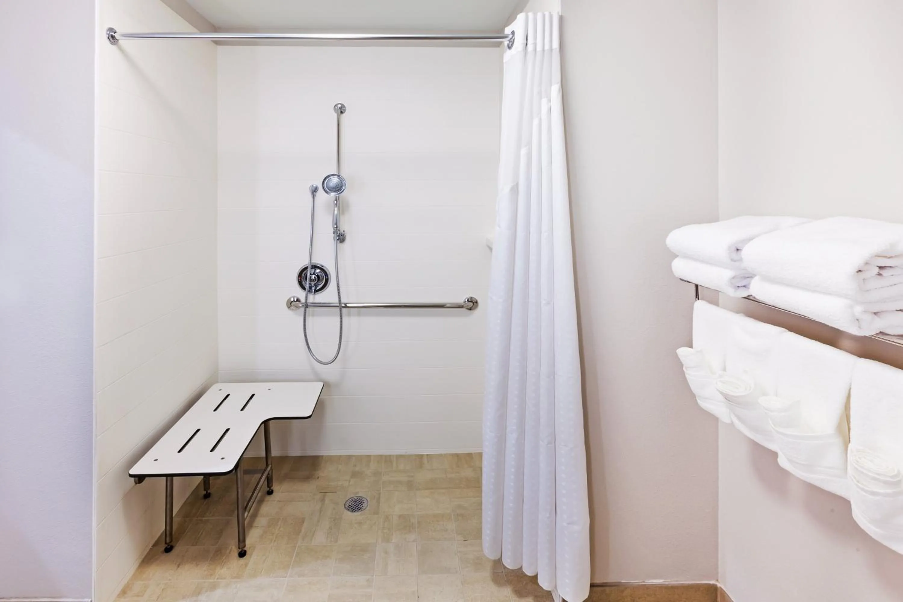Bathroom in Holiday Inn Express & Suites - Lenexa - Overland Park Area by IHG