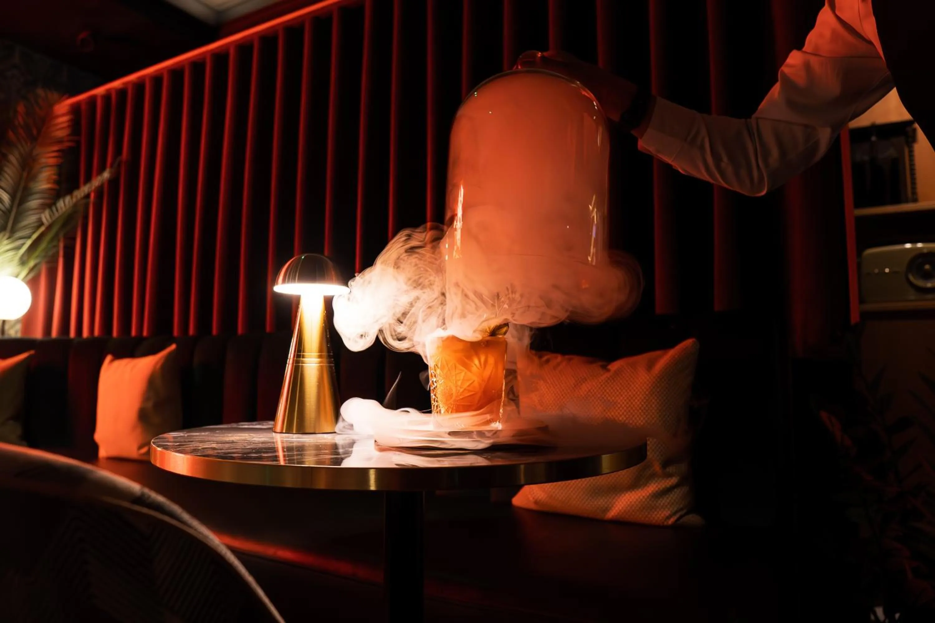 Lounge or bar in Pomme d'Or Hotel