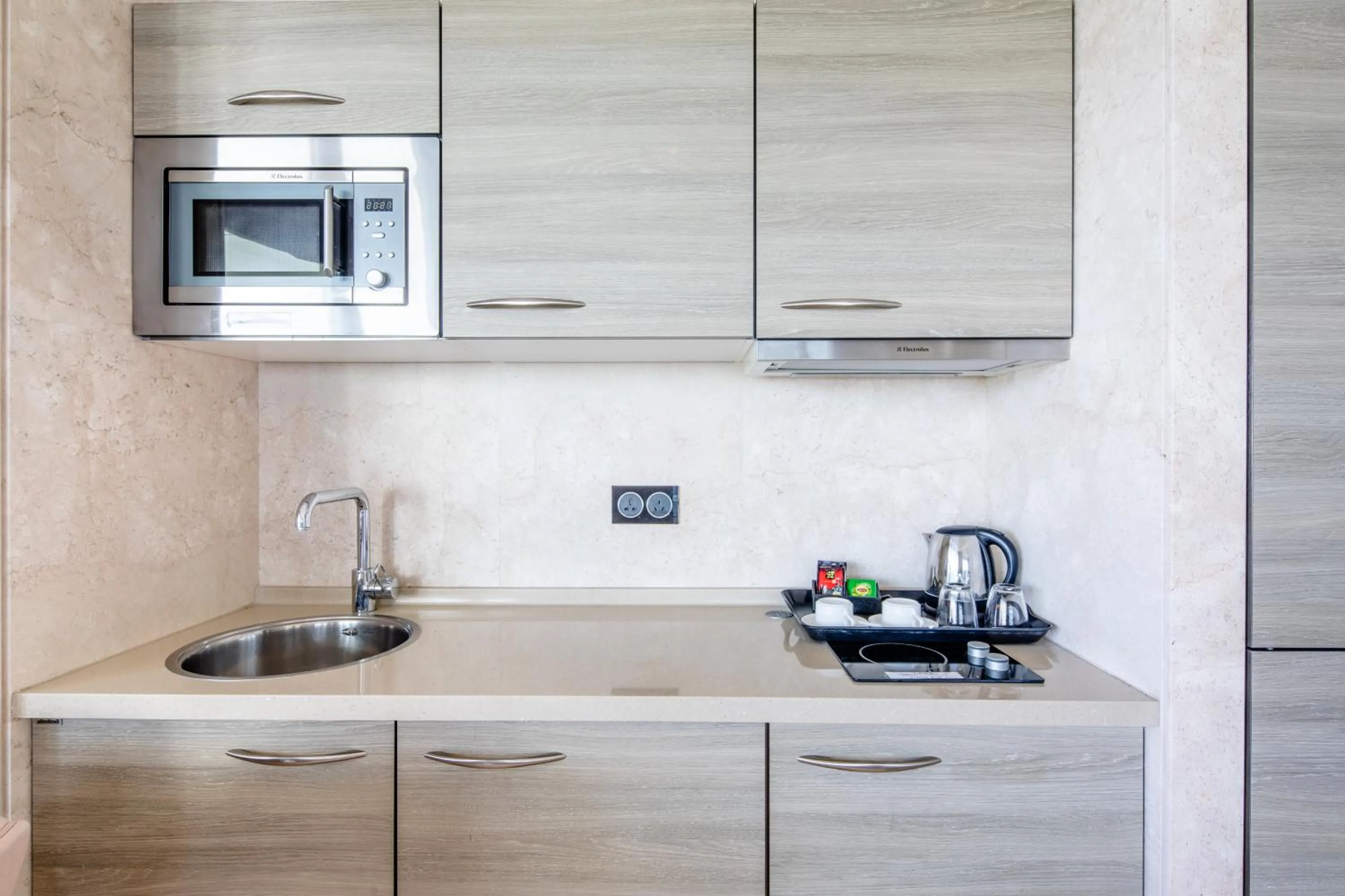 Kitchen or kitchenette in Sanya Phoenix Island Yuejia flat