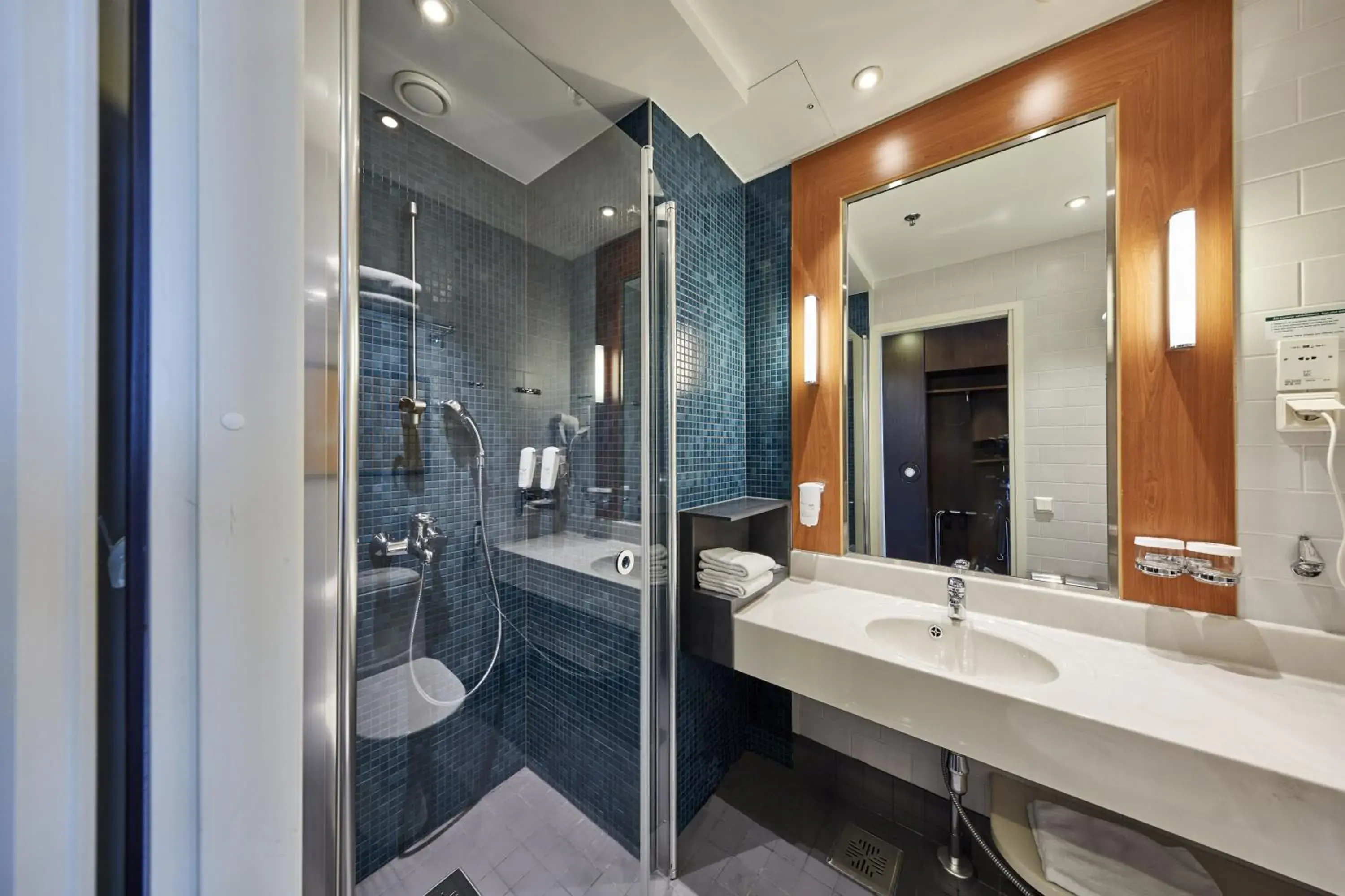 Bathroom in Holiday Inn Helsinki West - Ruoholahti by IHG Bathroom in Holiday Inn Helsinki West - Ruoholahti by IHG