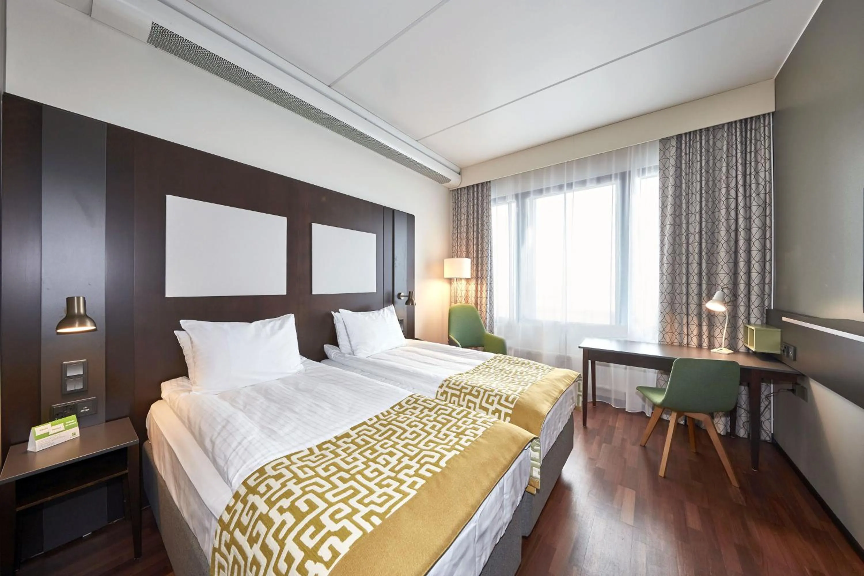 Photo of the whole room, Bed in Holiday Inn Helsinki West - Ruoholahti by IHG