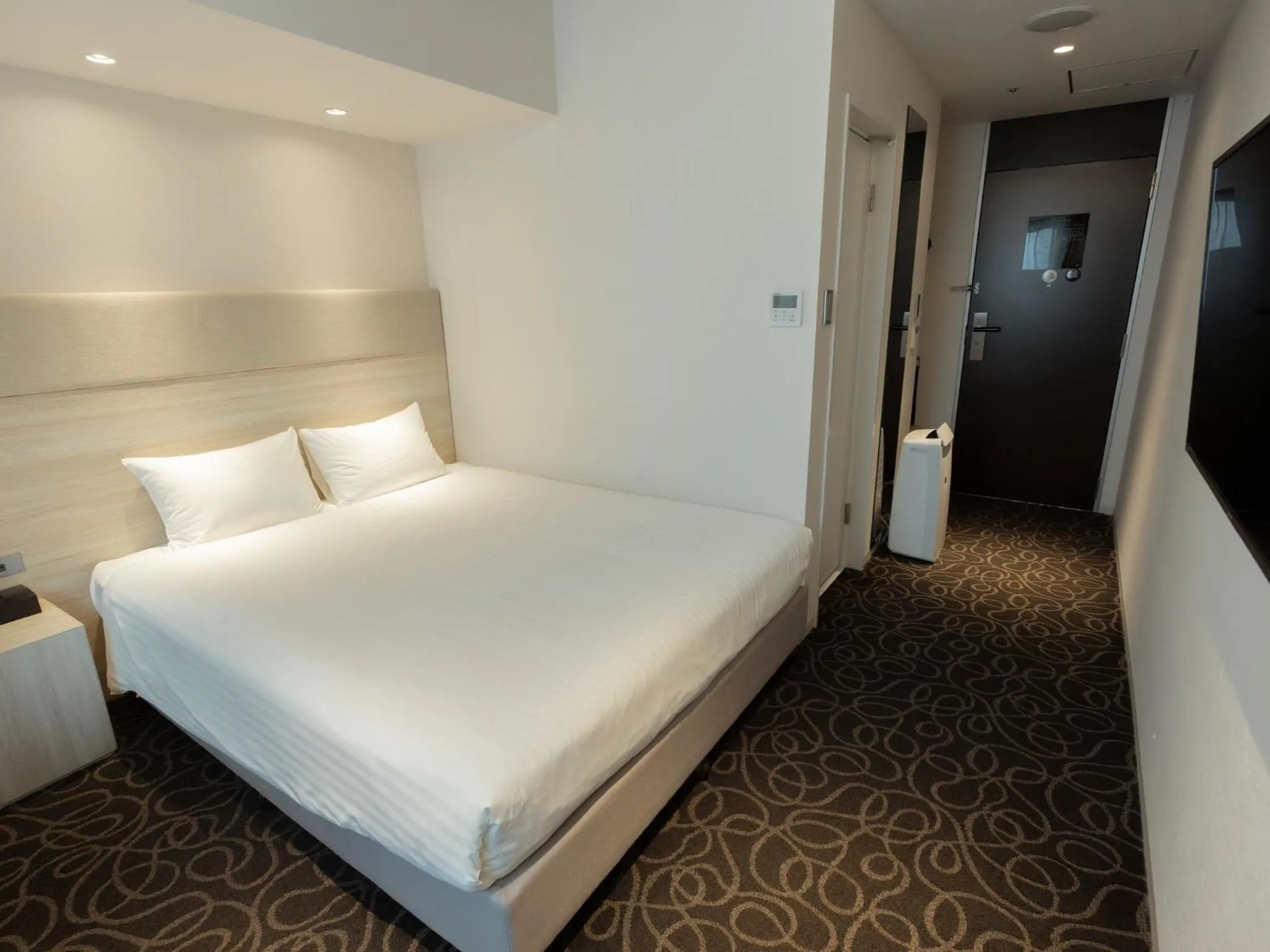 Bed in Hotel Aqua Citta Naha