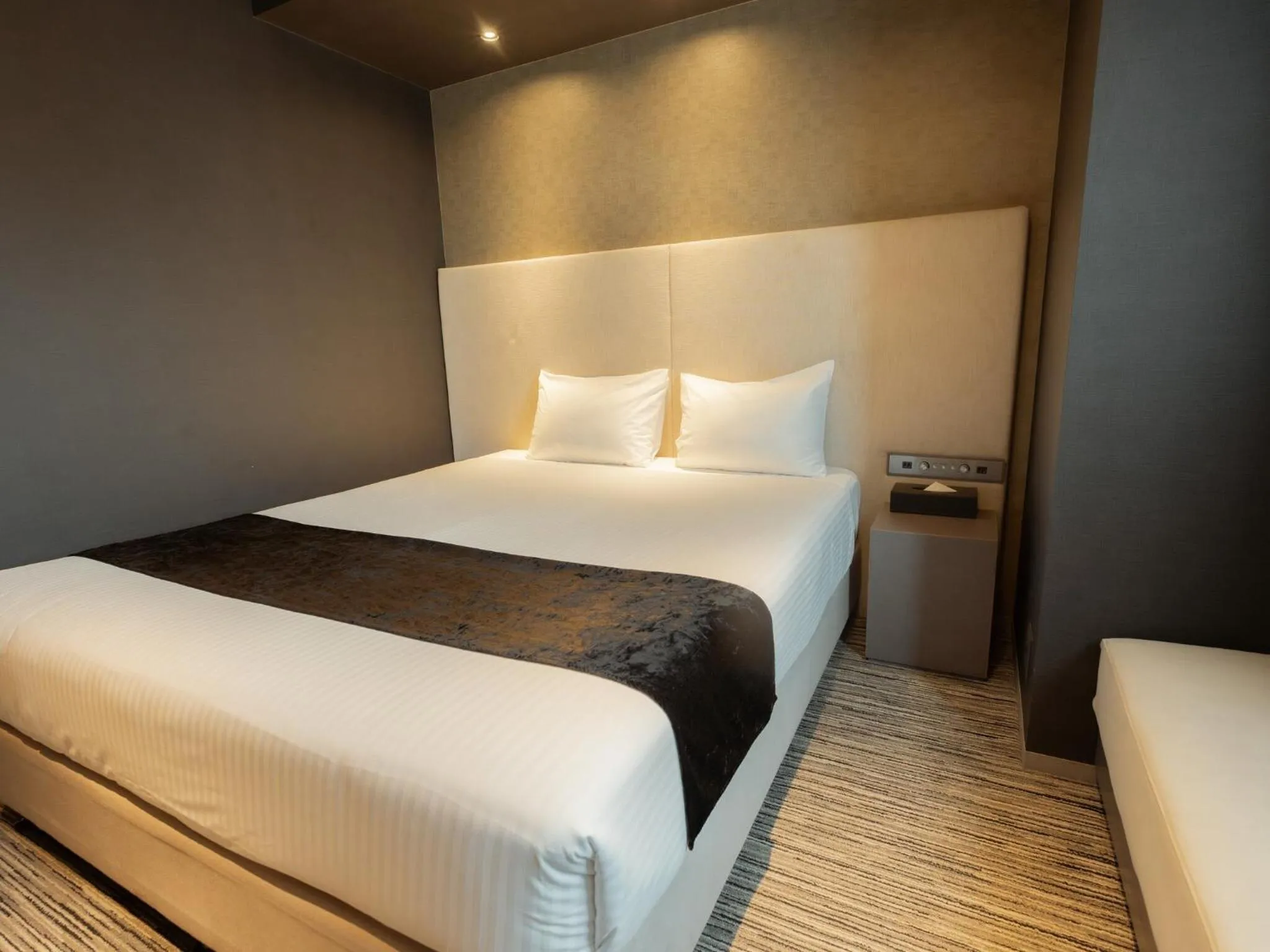 Bed in Hotel Aqua Citta Naha