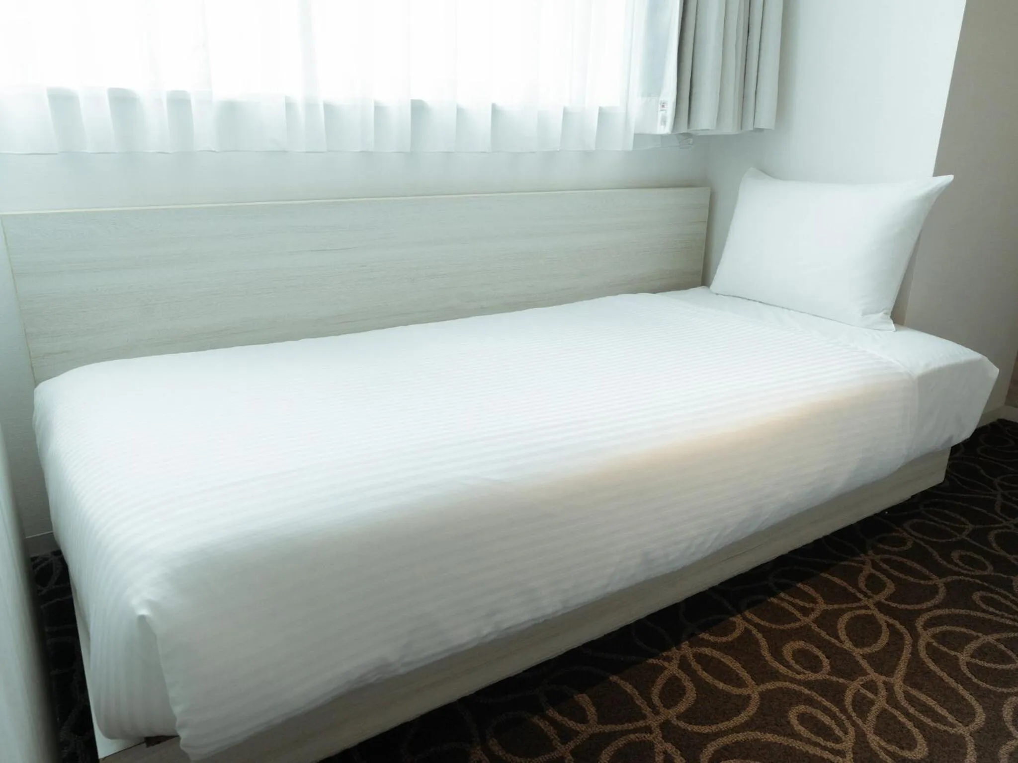 Bed in Hotel Aqua Citta Naha