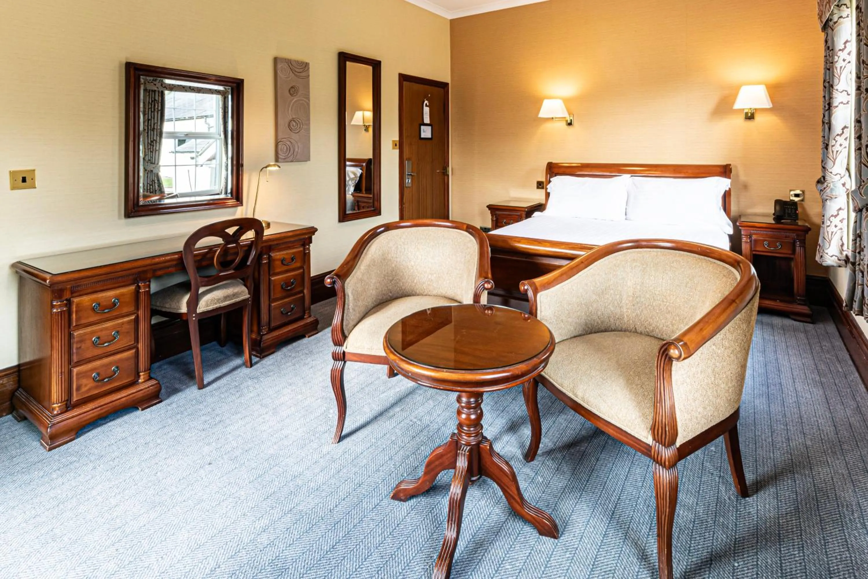 Seating area, Bed in Lake District Castle Inn