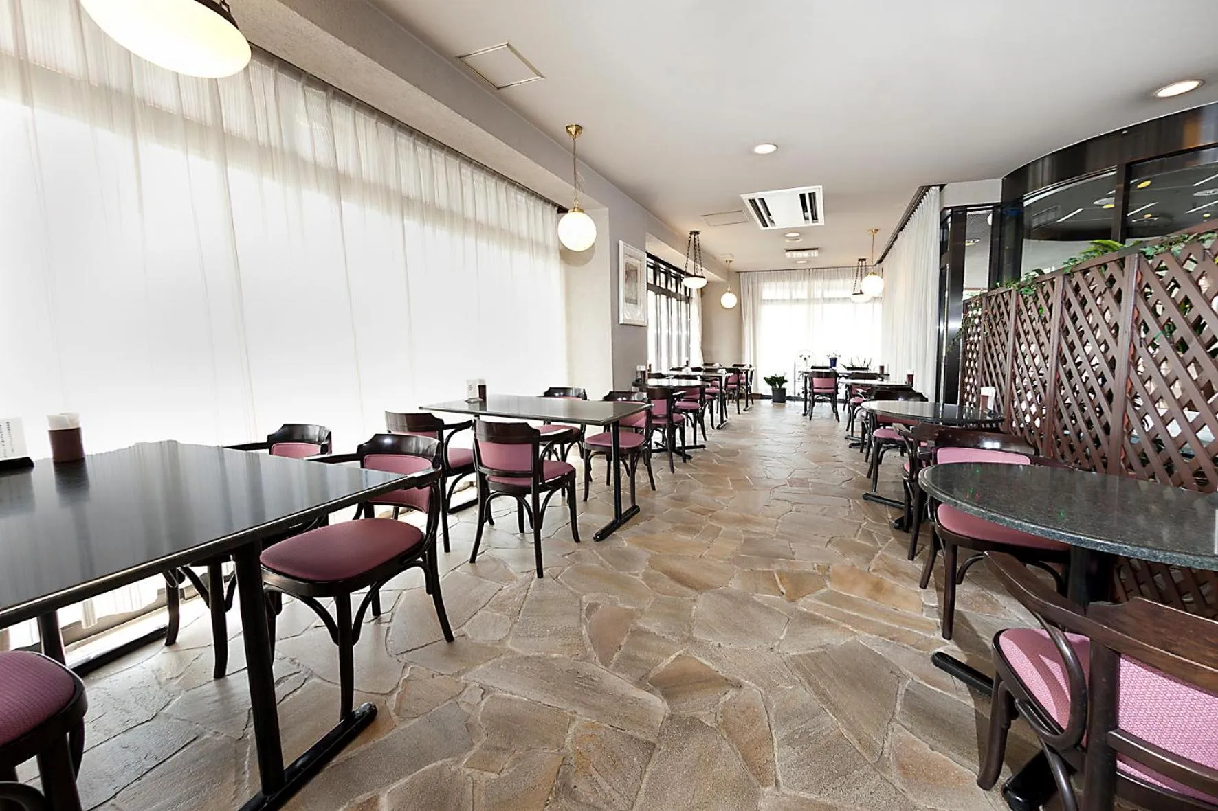 Communal lounge/ TV room in Kumegawa Wing Hotel