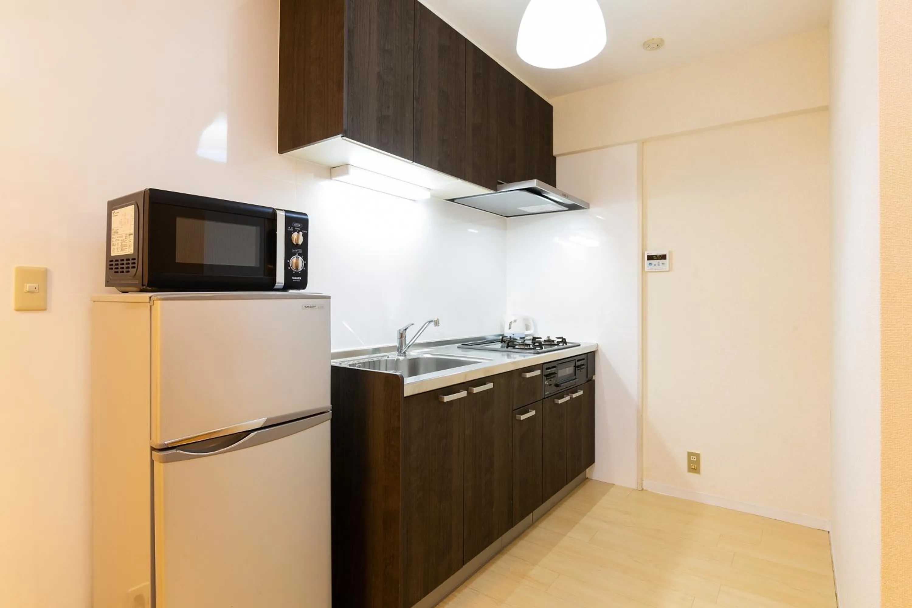 Kitchen or kitchenette in Stay Hakata