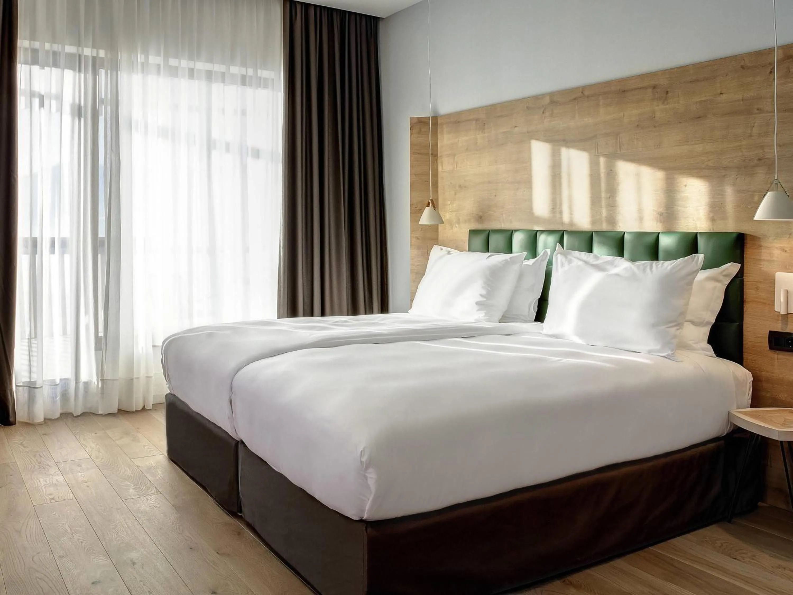 Bedroom, Bed in Tarcin Forest Resort & Spa Sarajevo - MGallery Collection