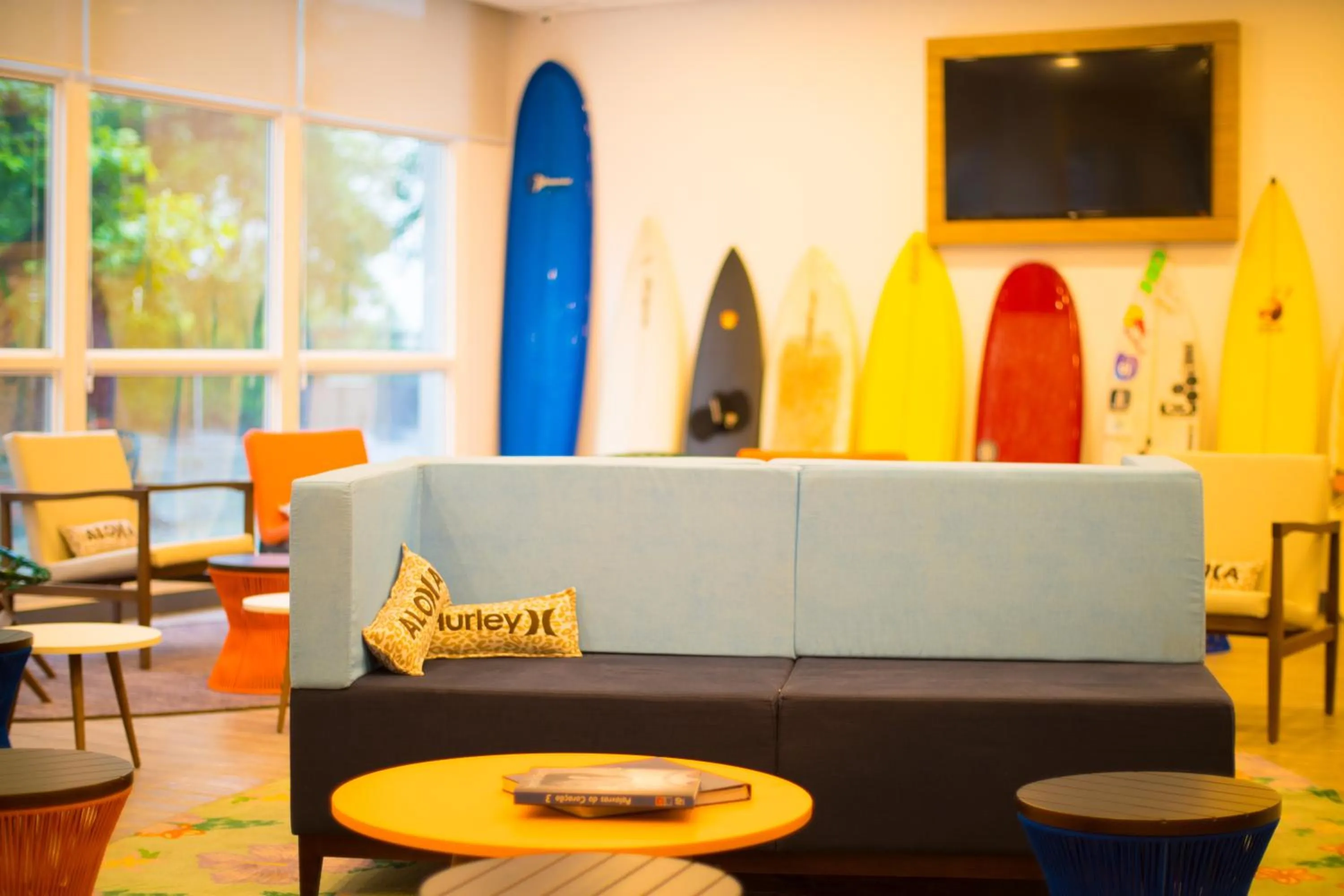 Communal lounge/ TV room in Delphin Surf Hotel