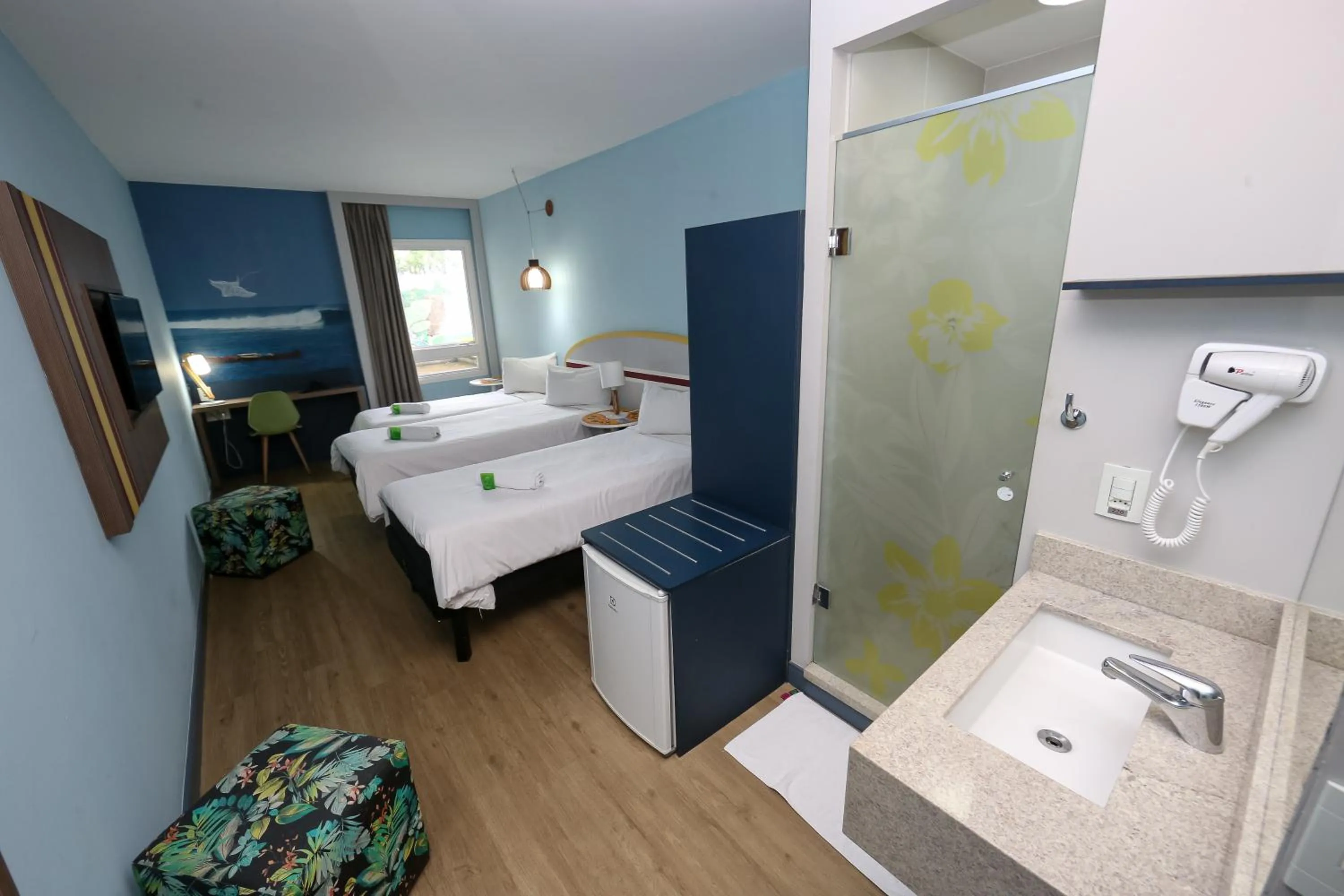 Toilet, Bed in Delphin Surf Hotel