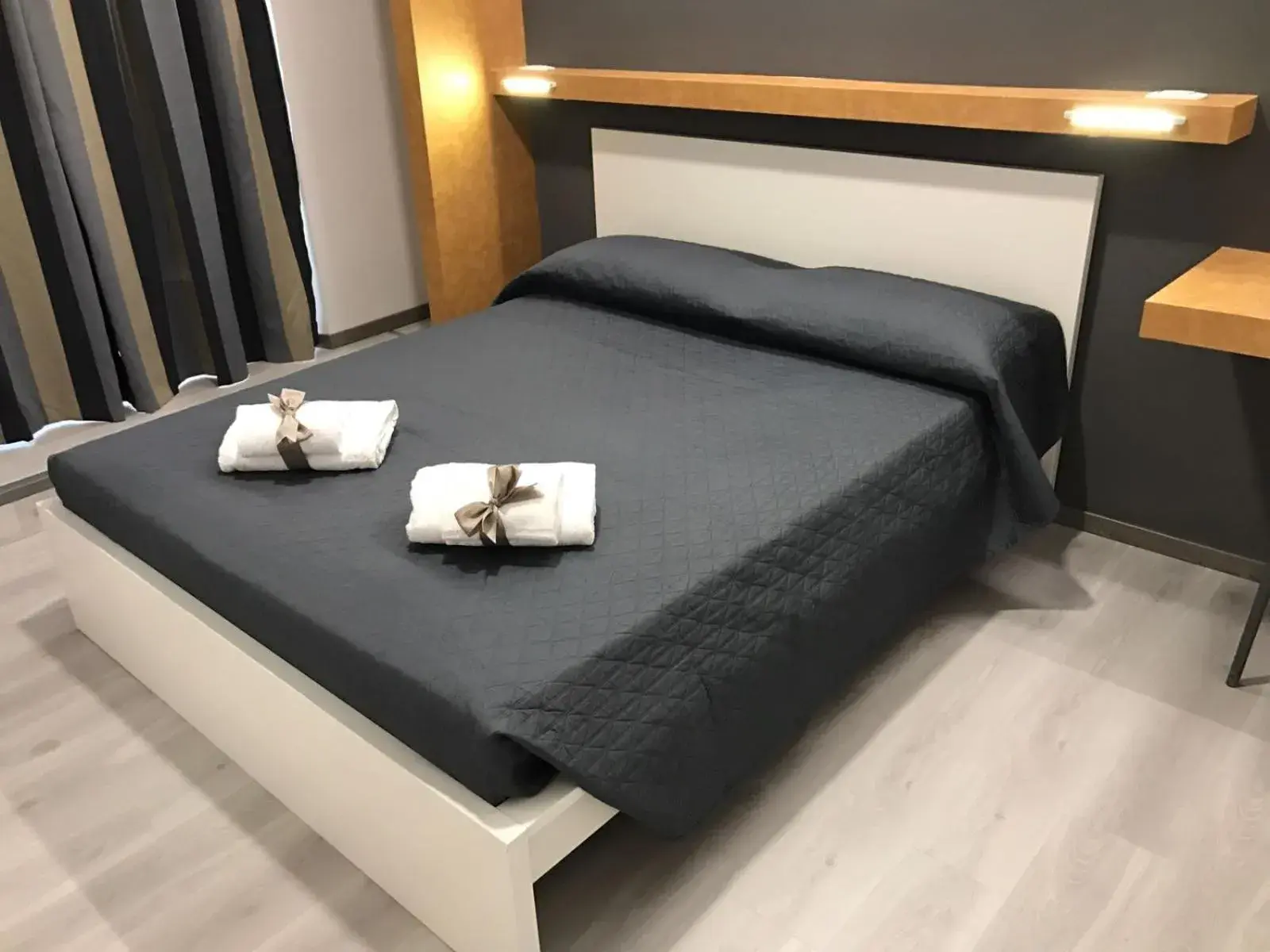 Photo of the whole room, Bed in Sangiò Guest House Photo of the whole room, Bed in Sangiò Guest House