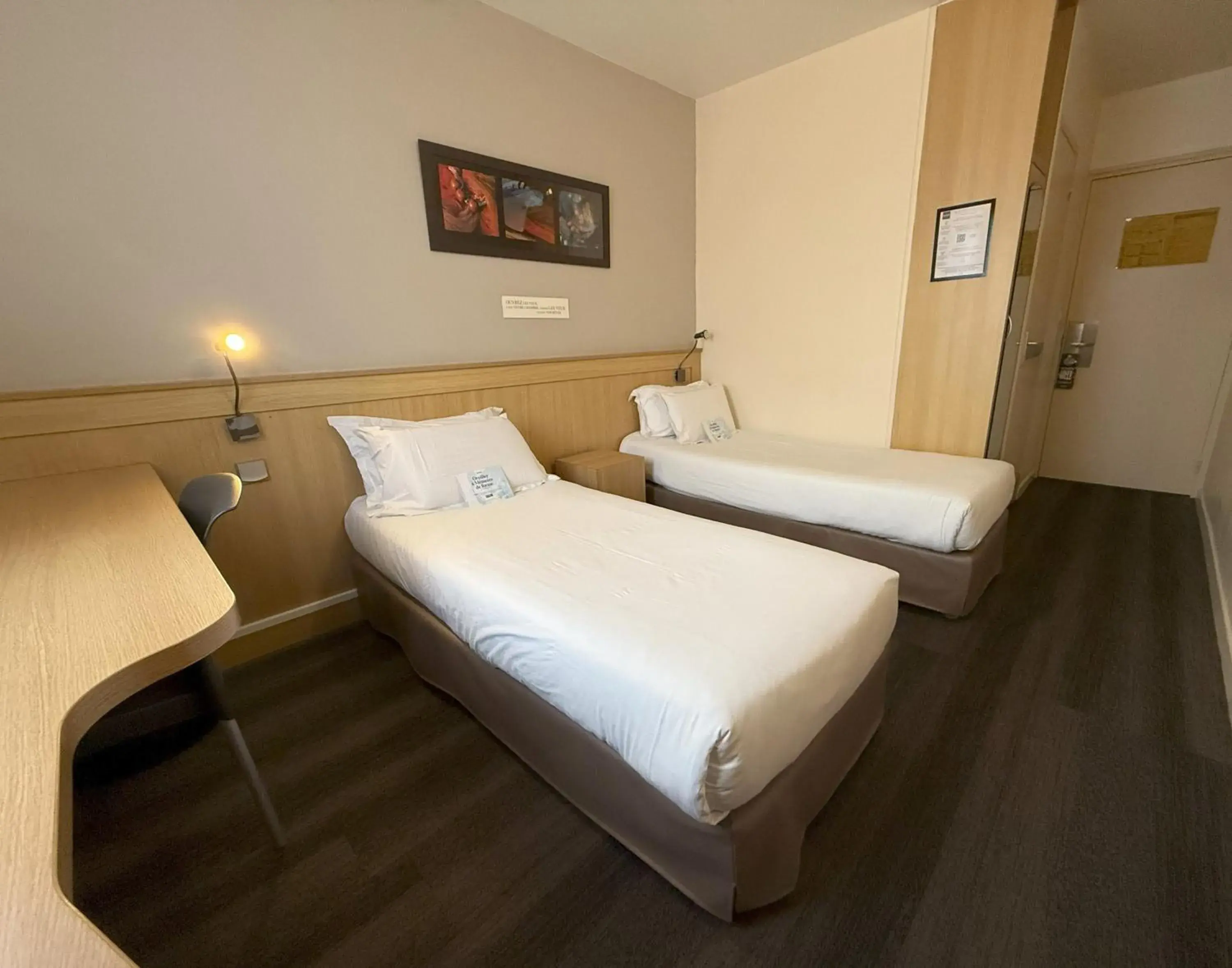 Bed in Kyriad Rennes Sud - Cesson Chantepie Bed in Kyriad Rennes Sud - Cesson Chantepie