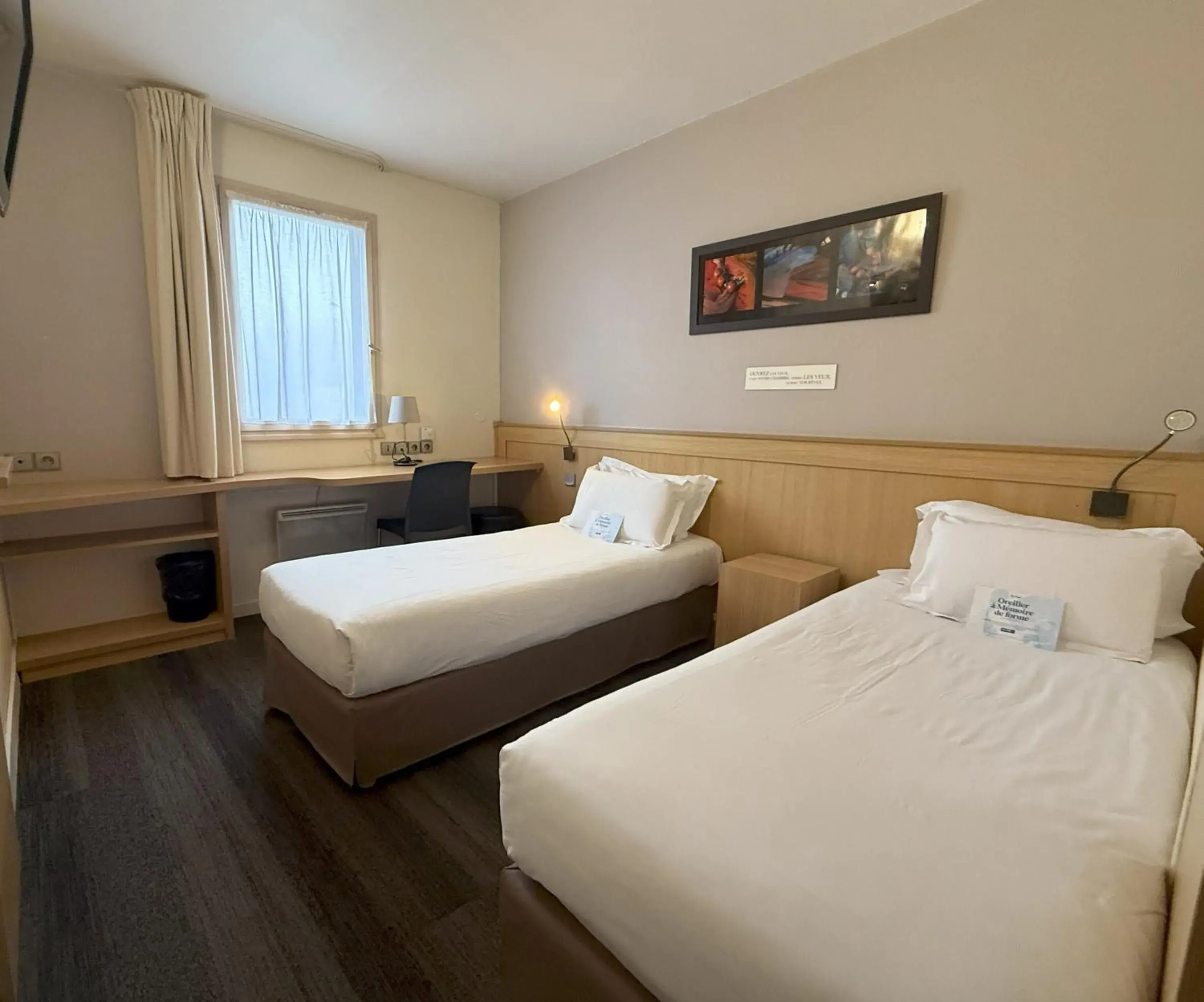 Bed in Kyriad Rennes Sud - Cesson Chantepie Bed in Kyriad Rennes Sud - Cesson Chantepie