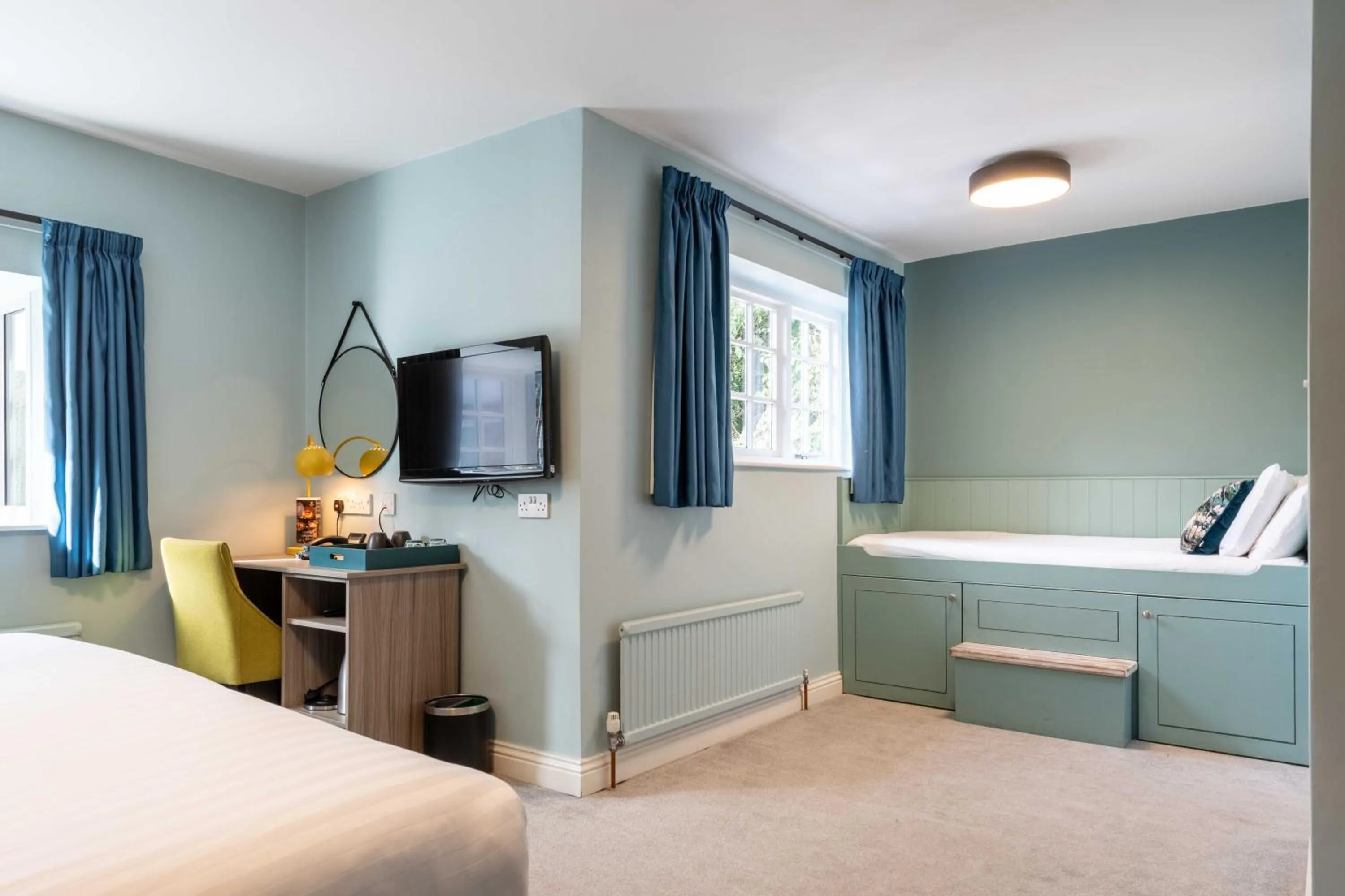 Bed in Wisteria Hotel