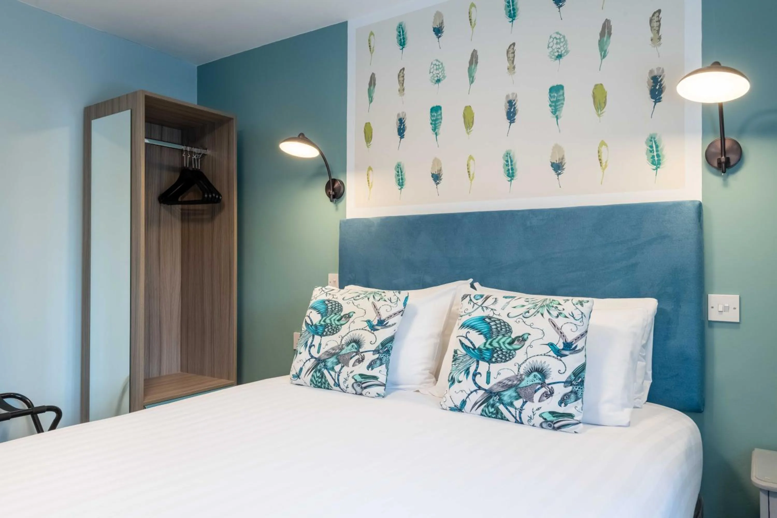 wardrobe, Bed in Wisteria Hotel