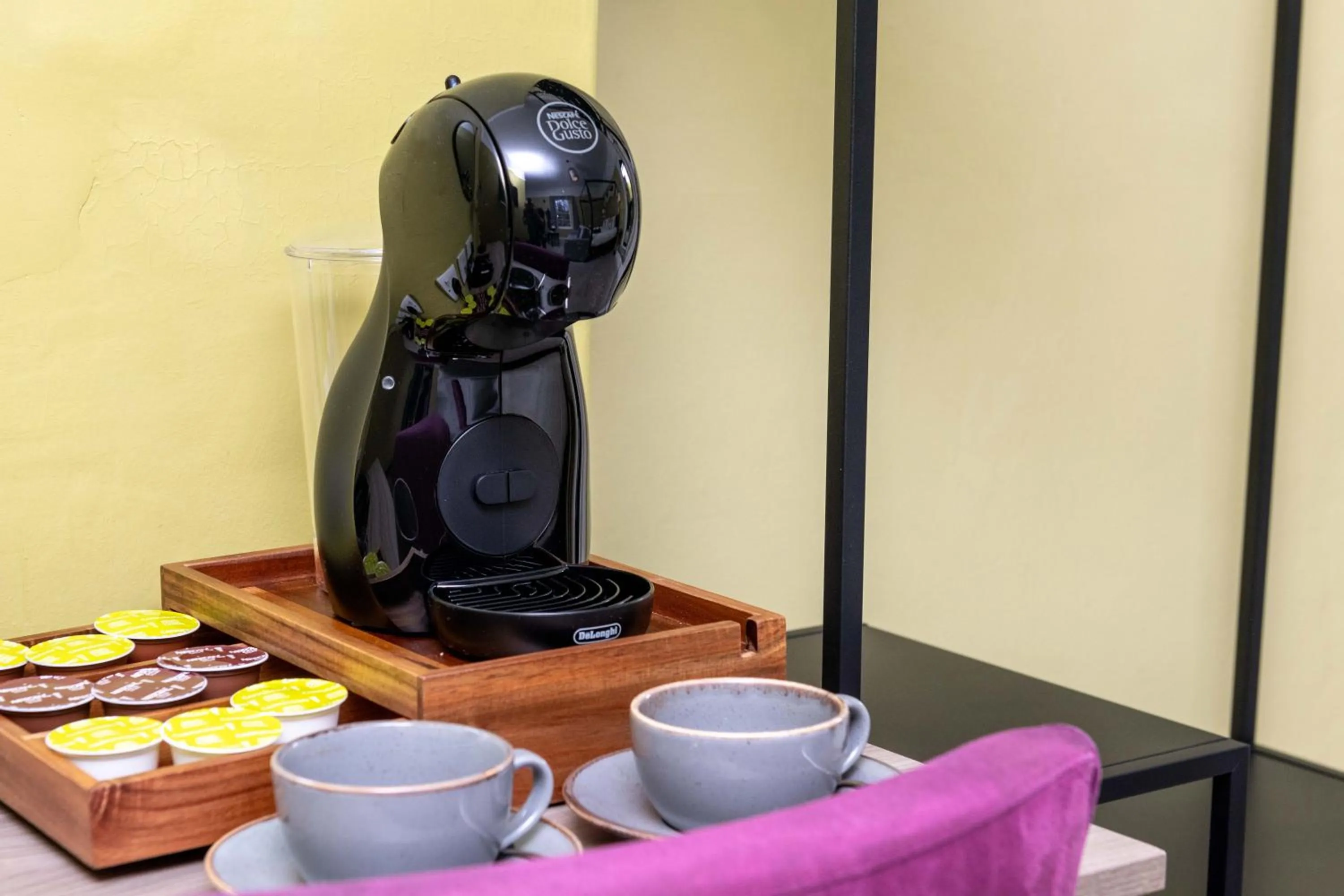 Coffee/tea facilities in Wisteria Hotel
