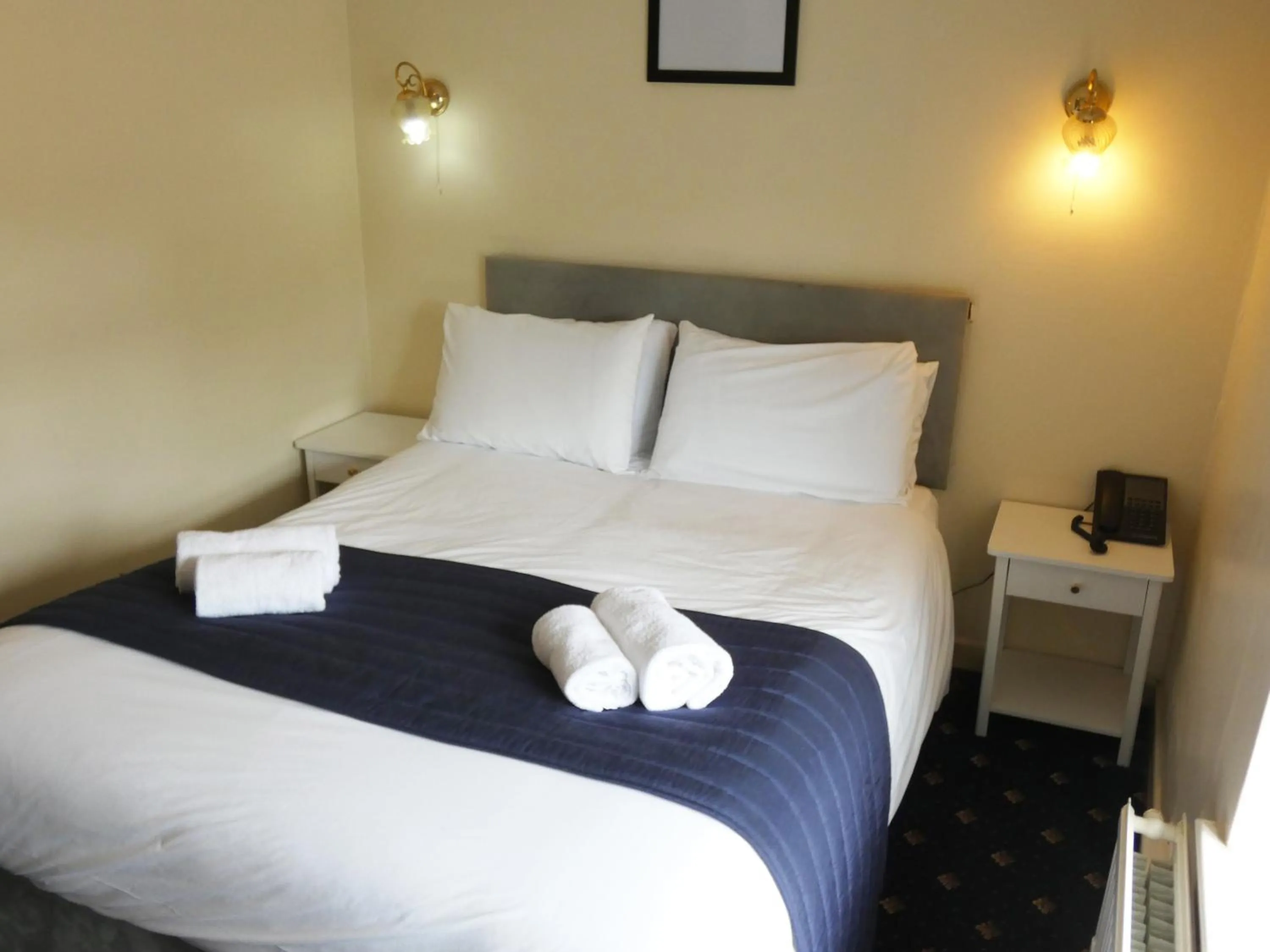 Bedroom in The Riverside Hotel