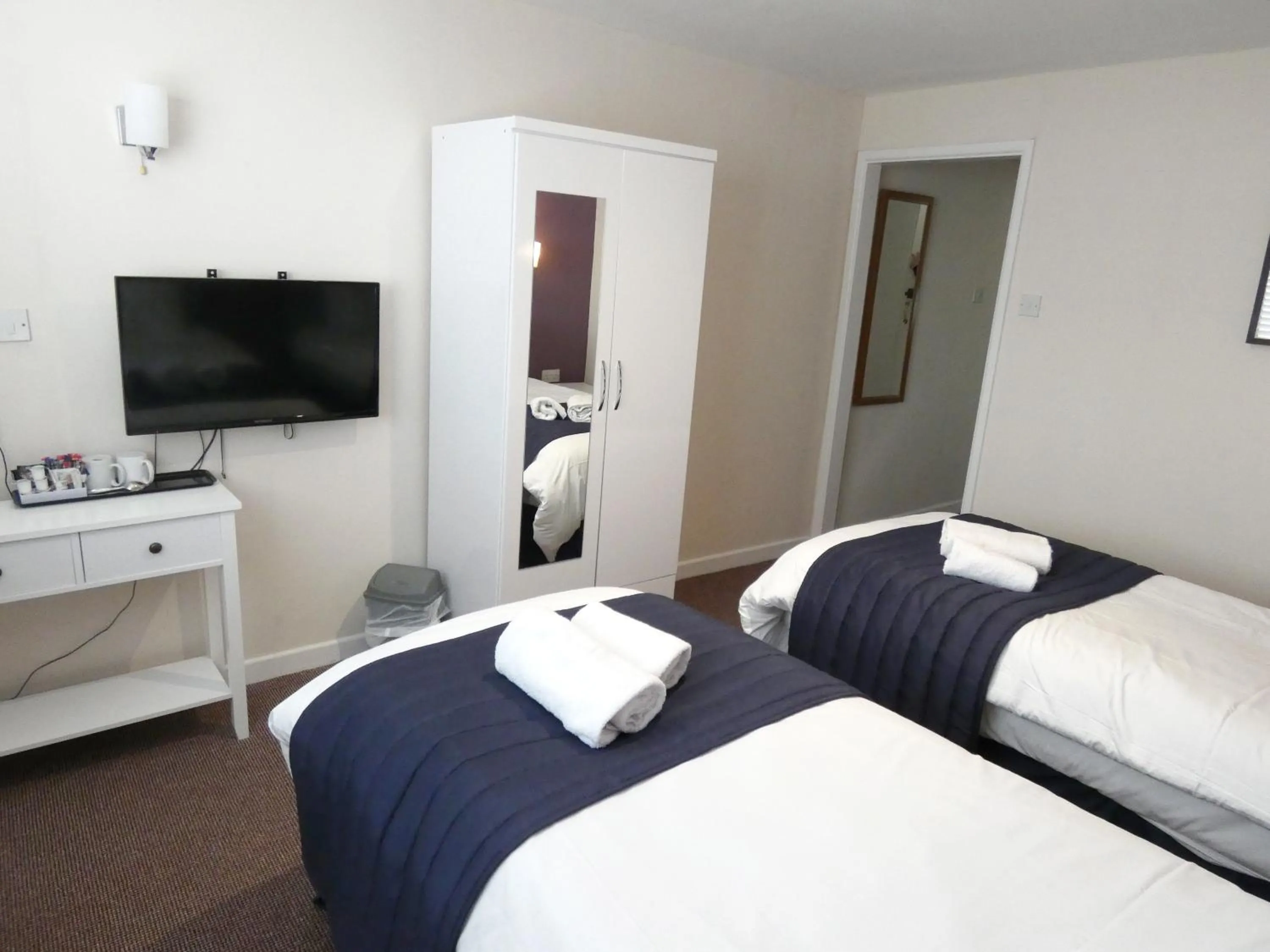 Bedroom in The Riverside Hotel