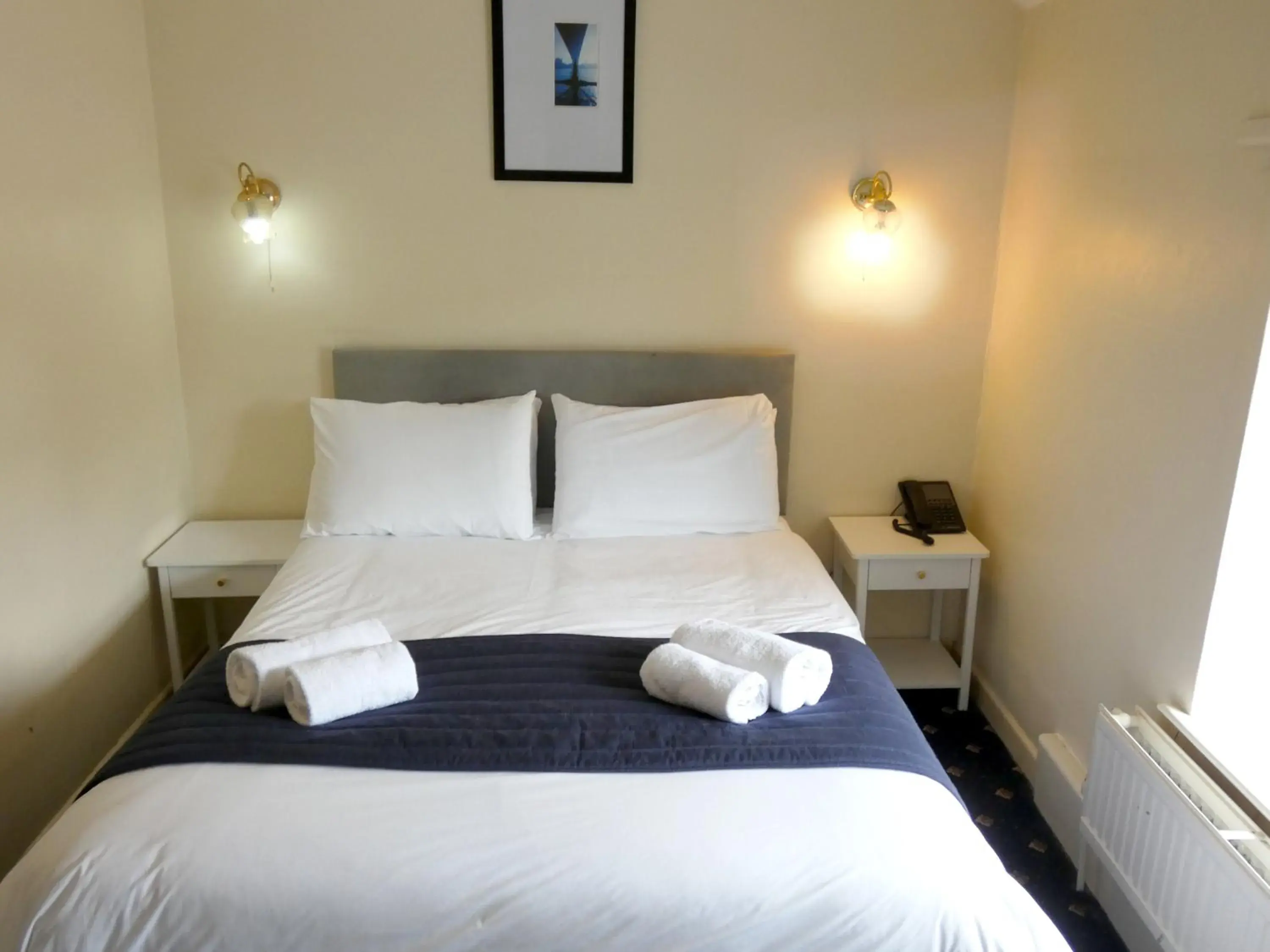 Bed in The Riverside Hotel Bed in The Riverside Hotel