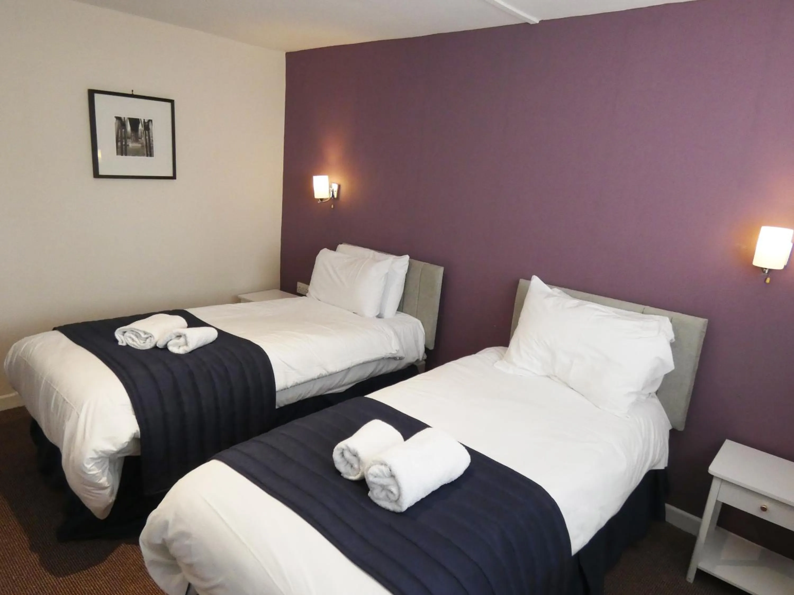 Bedroom in The Riverside Hotel