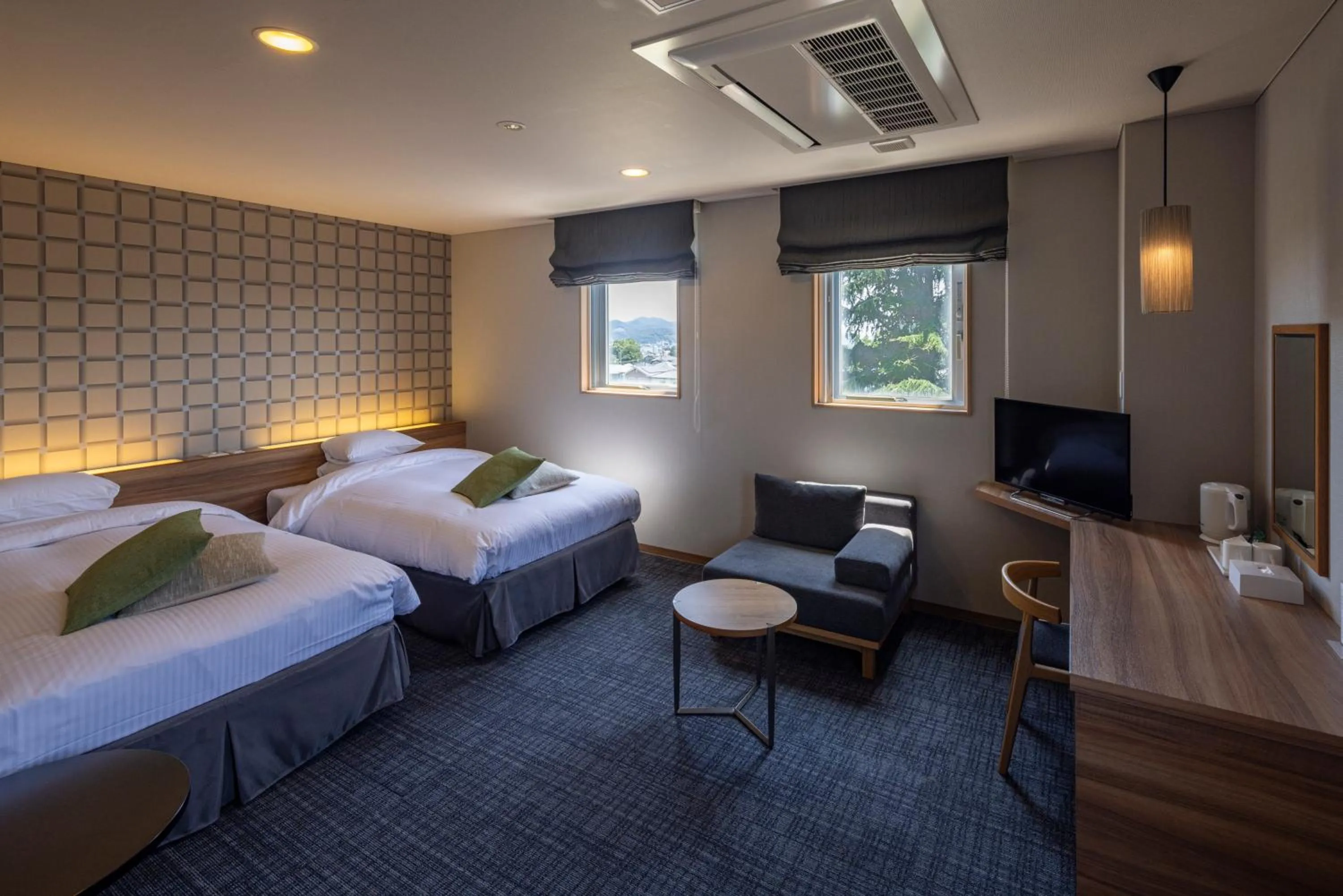 Bed in Kiryu Grand Hotel