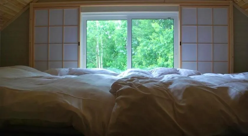 Bed in Auberge Ninguruforet