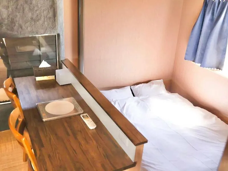 Bed in Auberge Ninguruforet