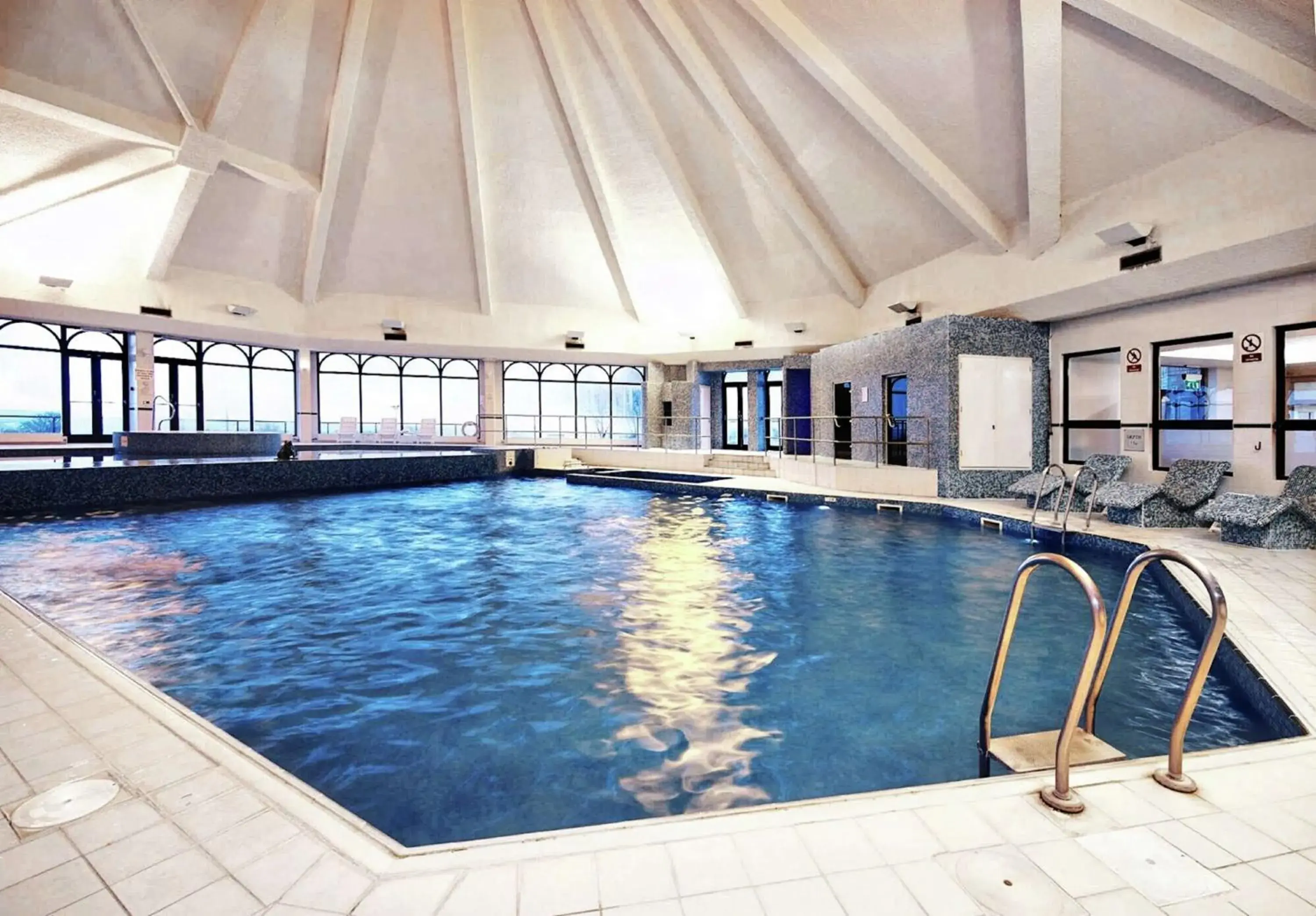Pool view in Glasgow Westerwood Hotel, Spa & Golf Resort Pool view in Glasgow Westerwood Hotel, Spa & Golf Resort