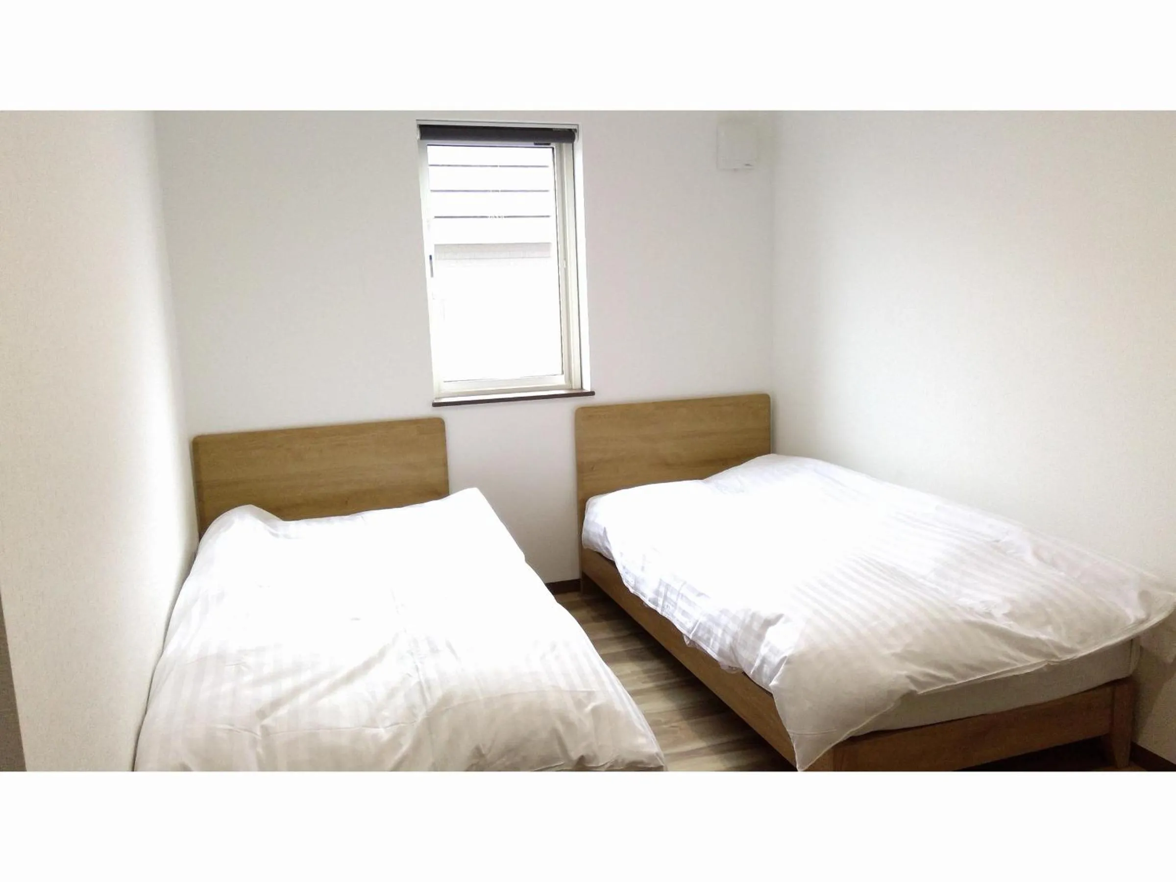 Bed in Minshuku Cress