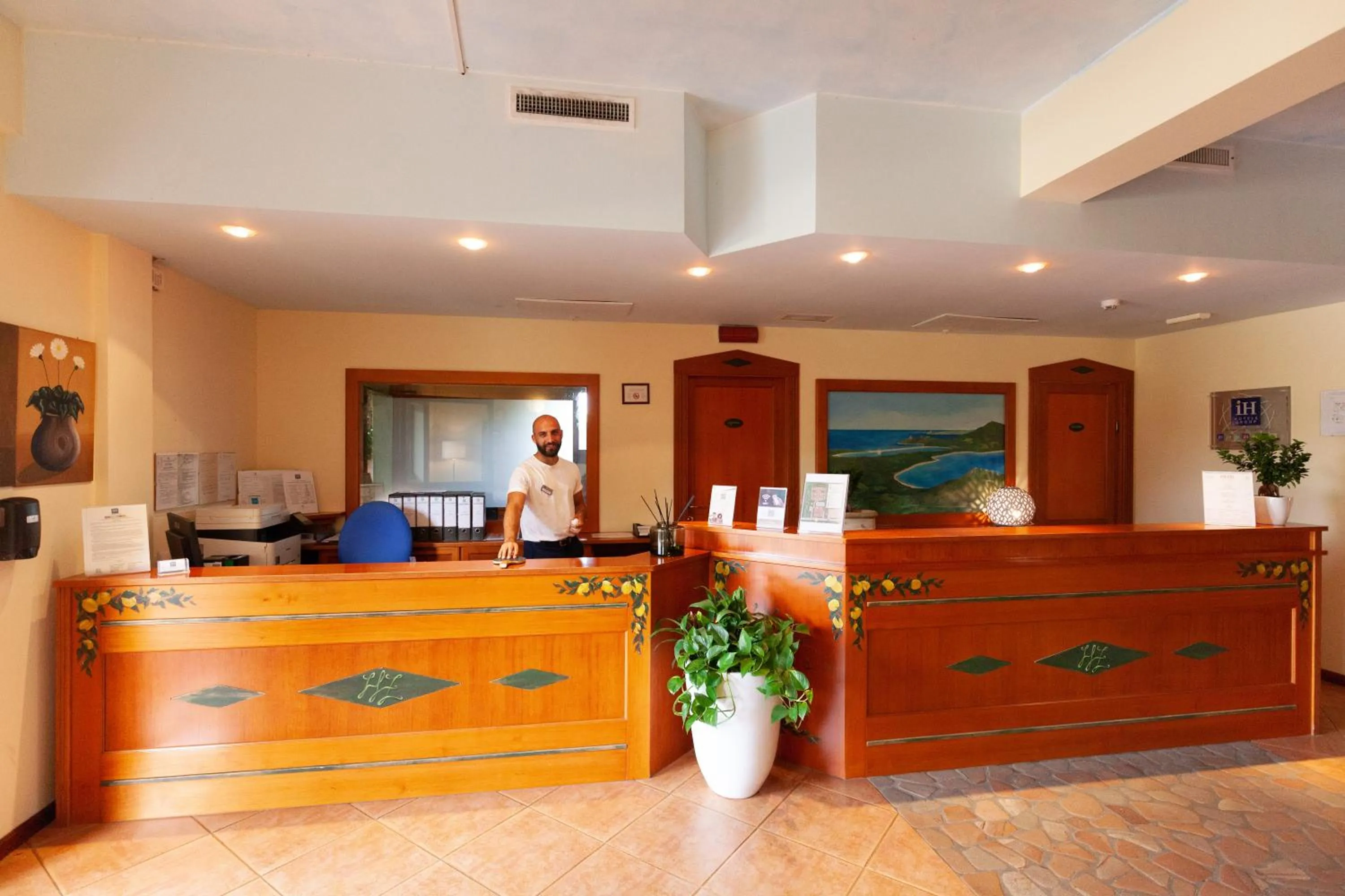 Lobby or reception in iH Hotels Le Zagare Resort