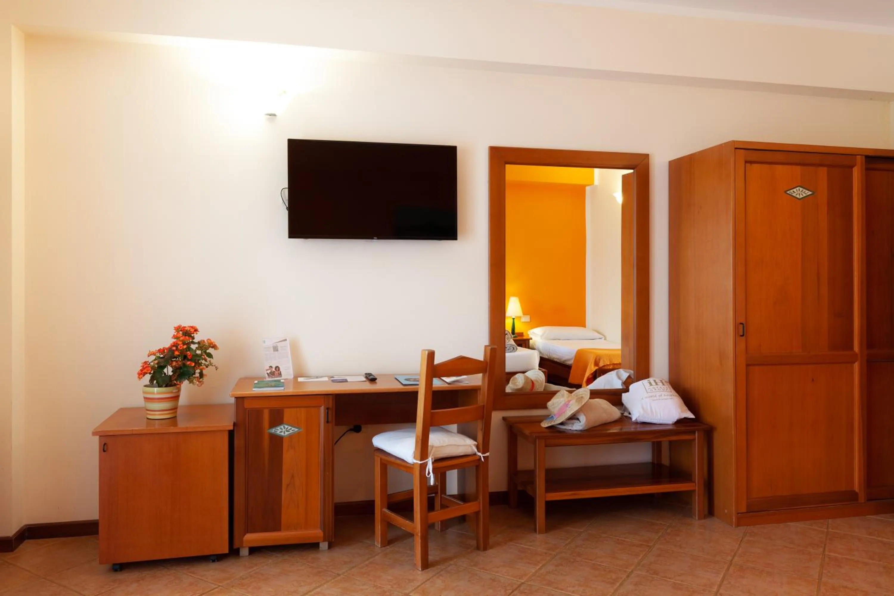 Bedroom in iH Hotels Le Zagare Resort