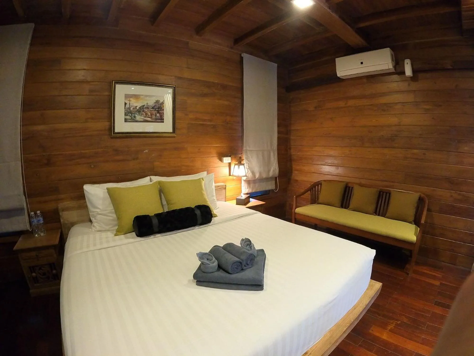 Bed in Tolani Riverside Villa