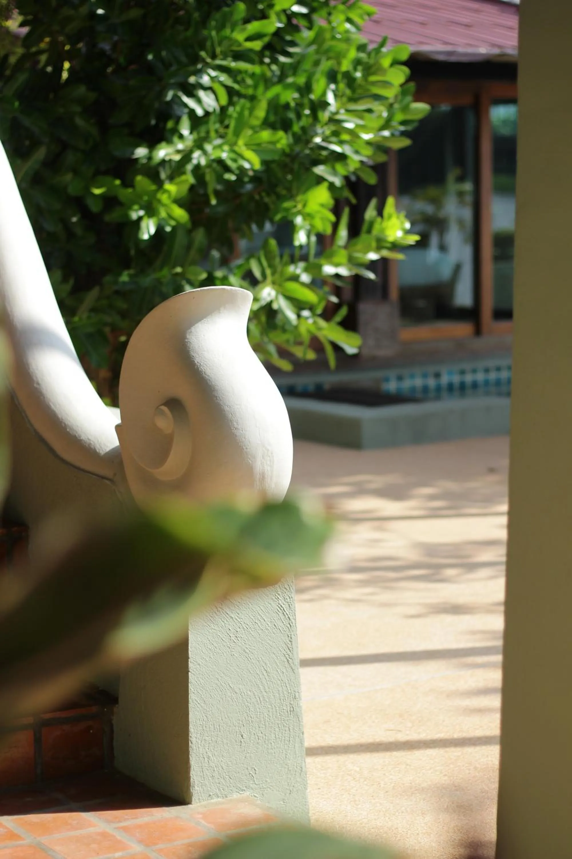 Garden view in Tolani Riverside Villa