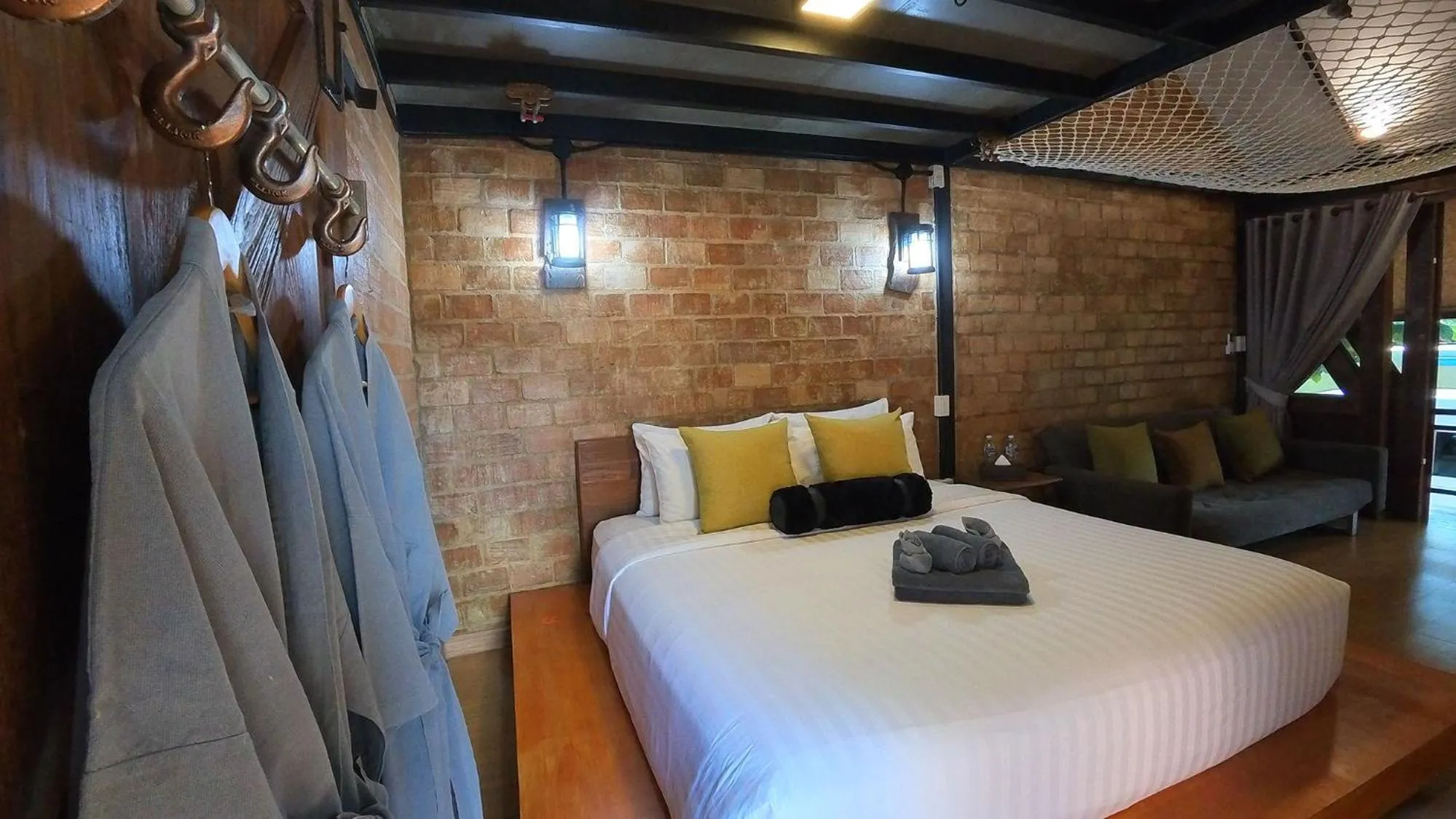 Bed in Tolani Riverside Villa