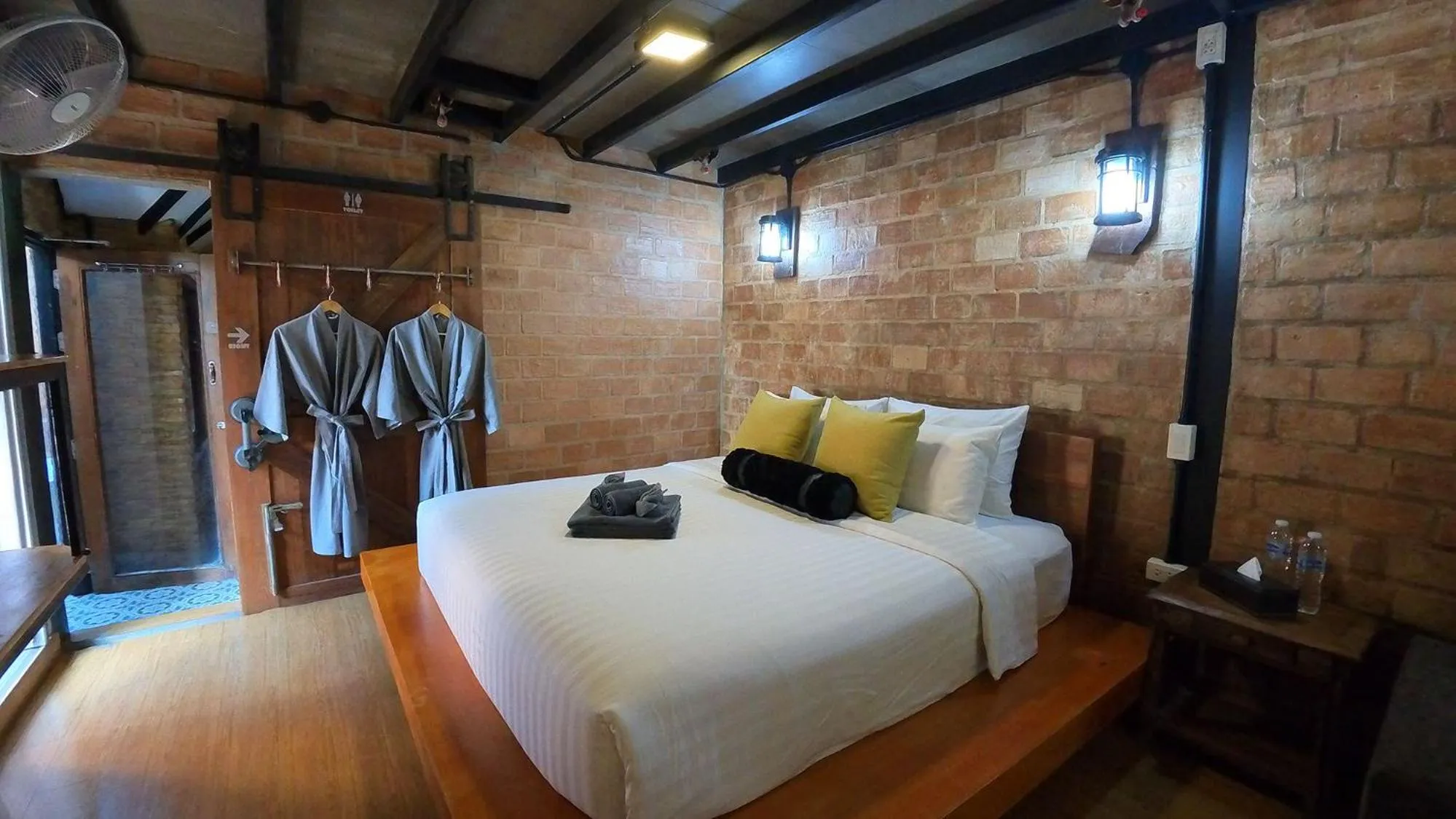 Bed in Tolani Riverside Villa