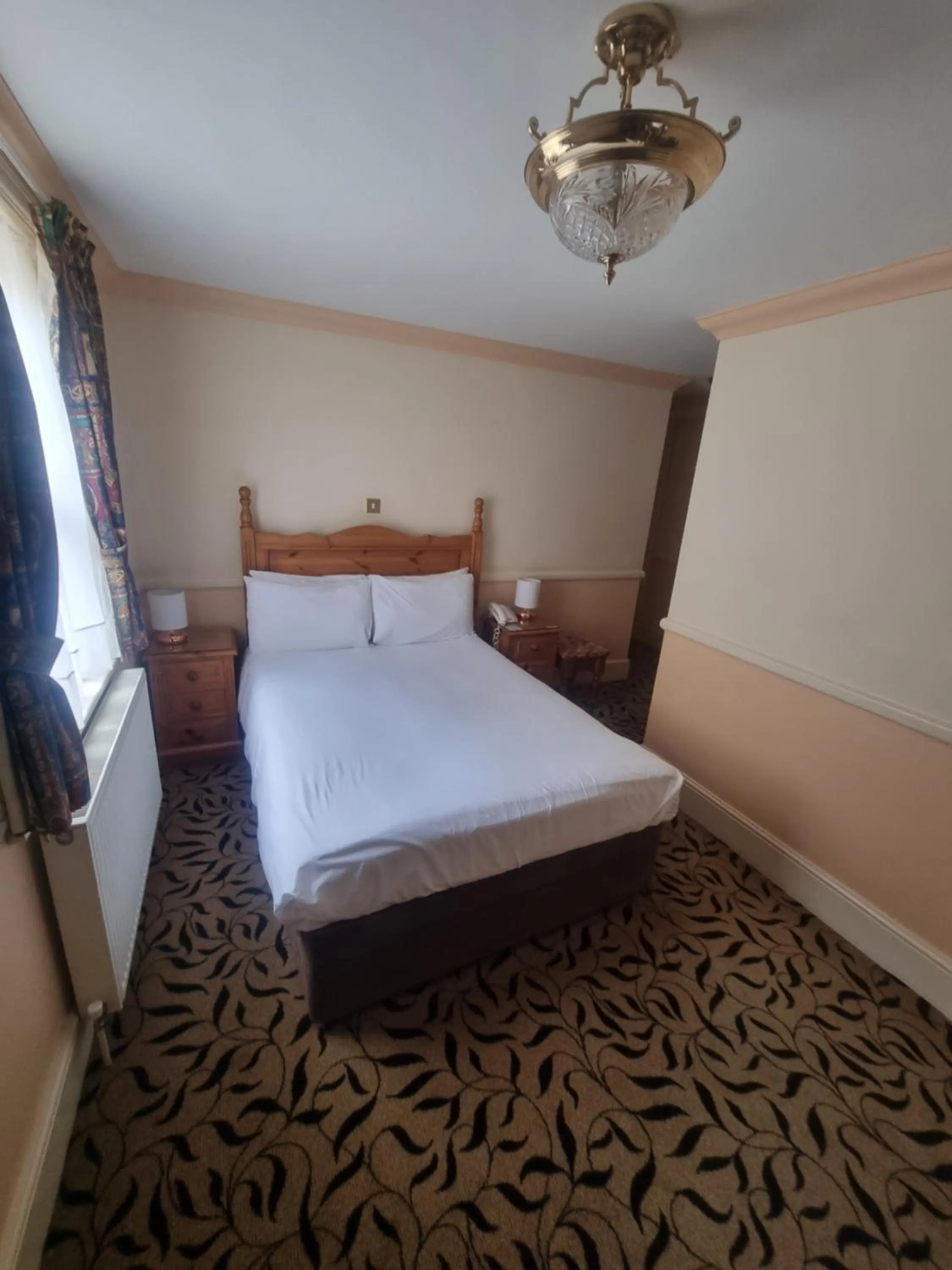 Bed in The Royal Oak Hotel