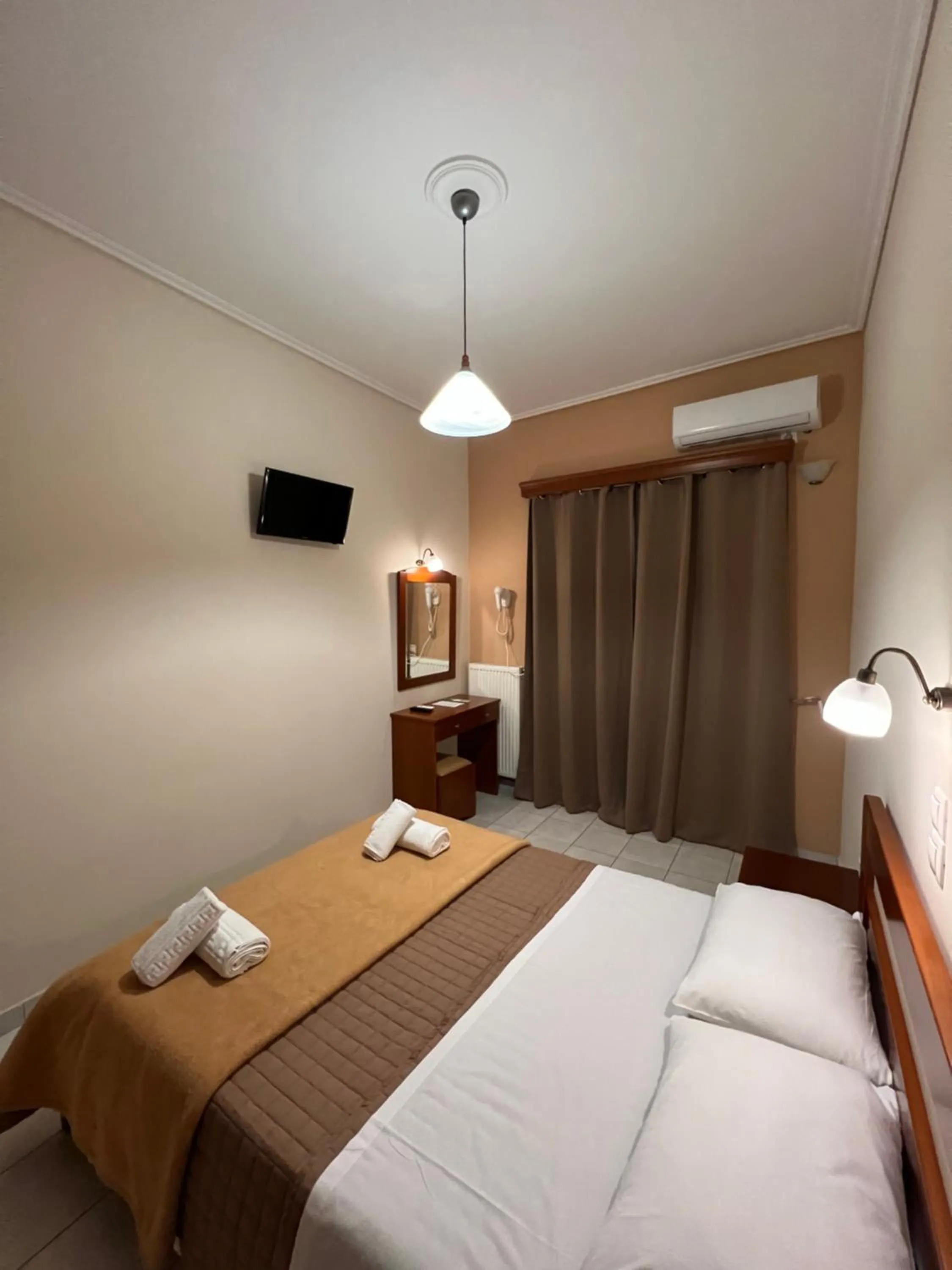 Bed in Hotel Nevada Kalamata