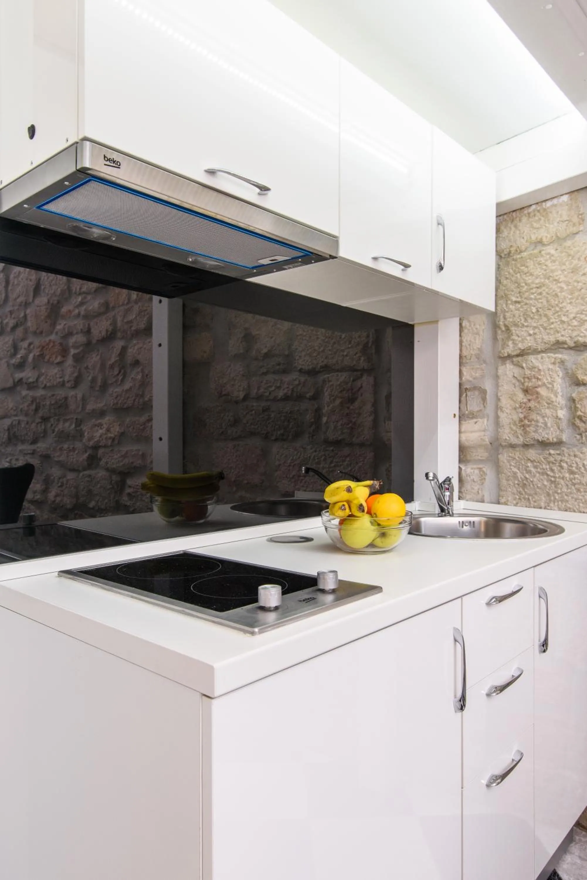 Kitchen or kitchenette in Studio Apartman REA