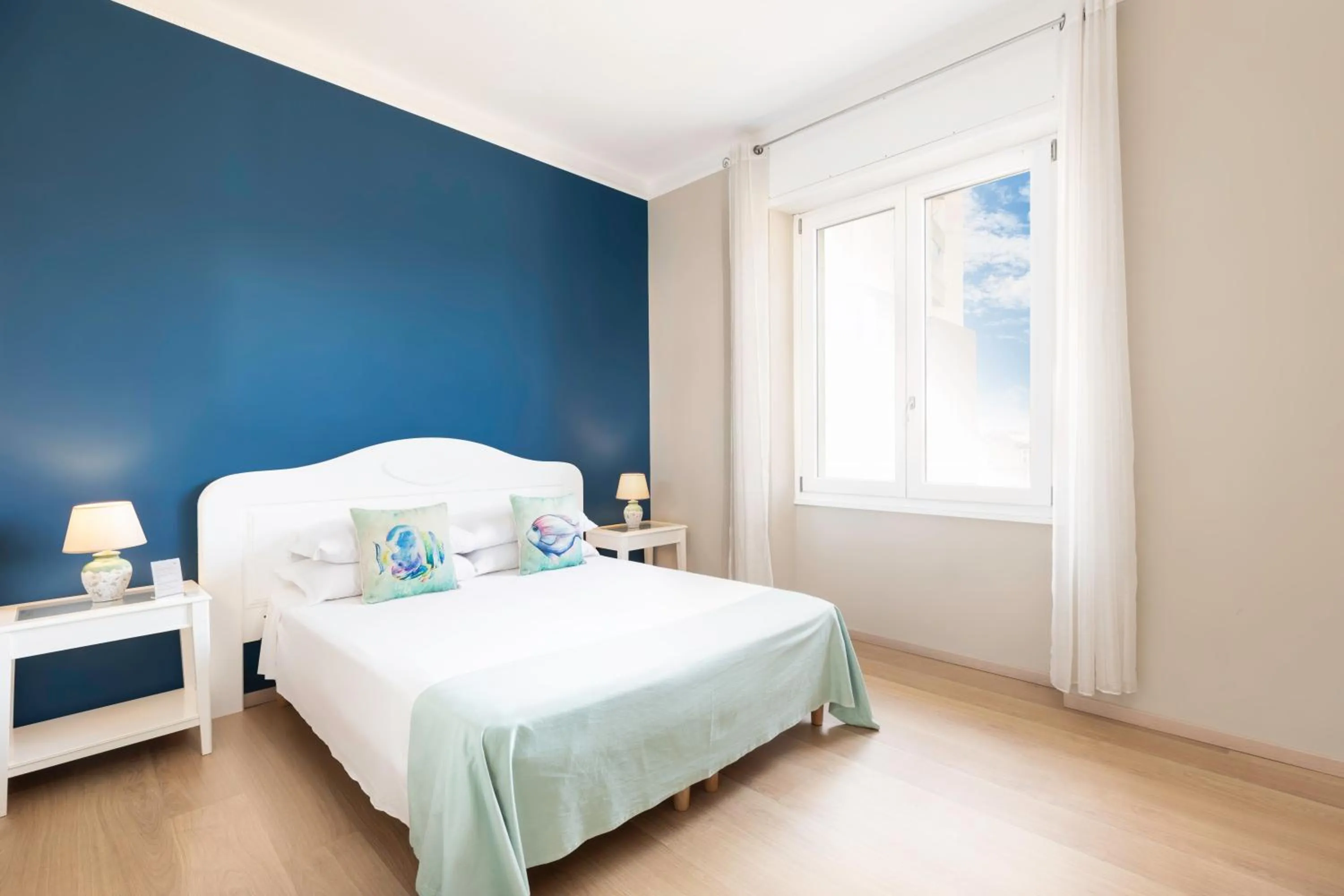 Bed in Colibrì Prestige Rooms - Roman Ruins View