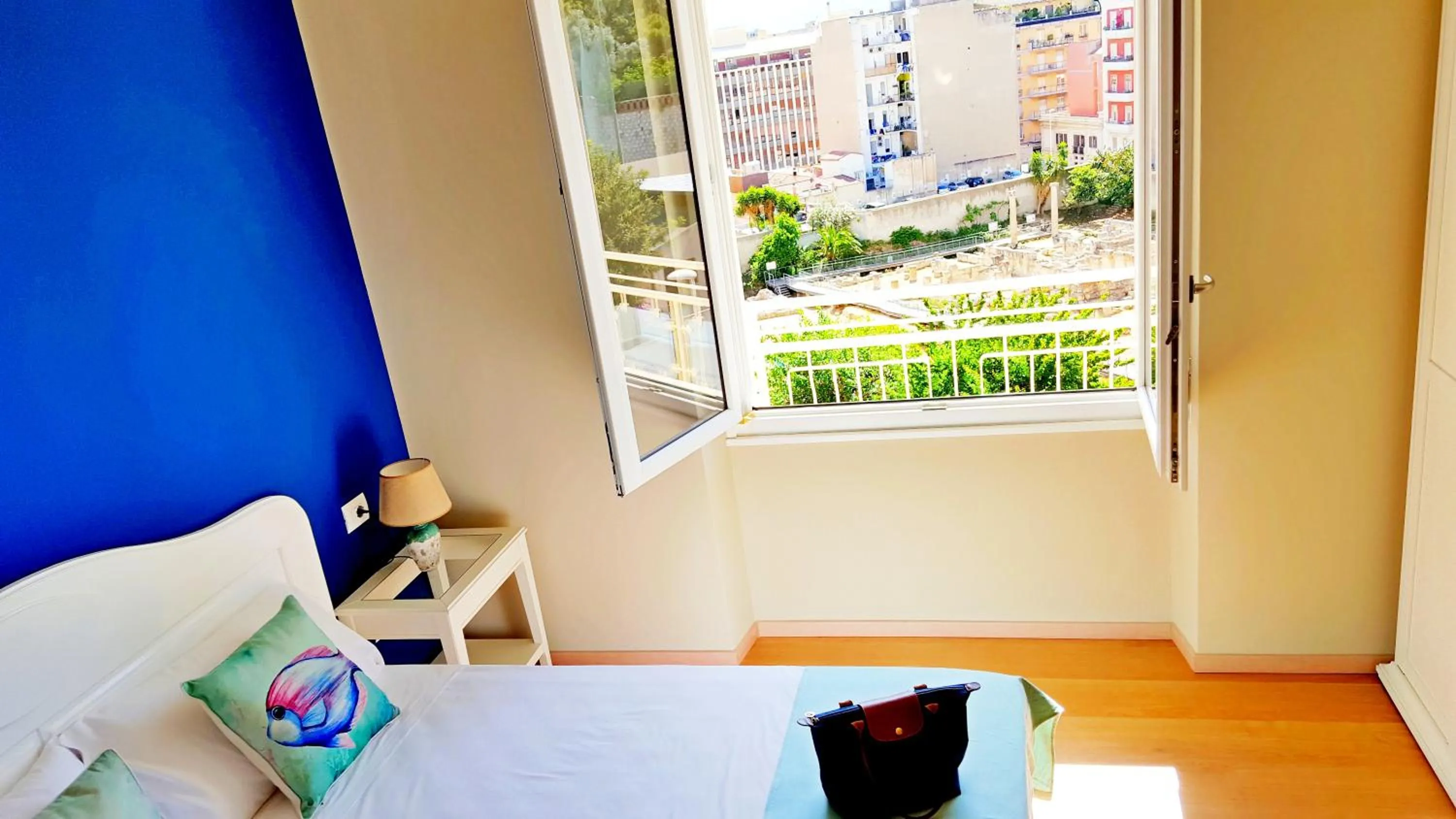 Bed in Colibrì Prestige Rooms - Roman Ruins View