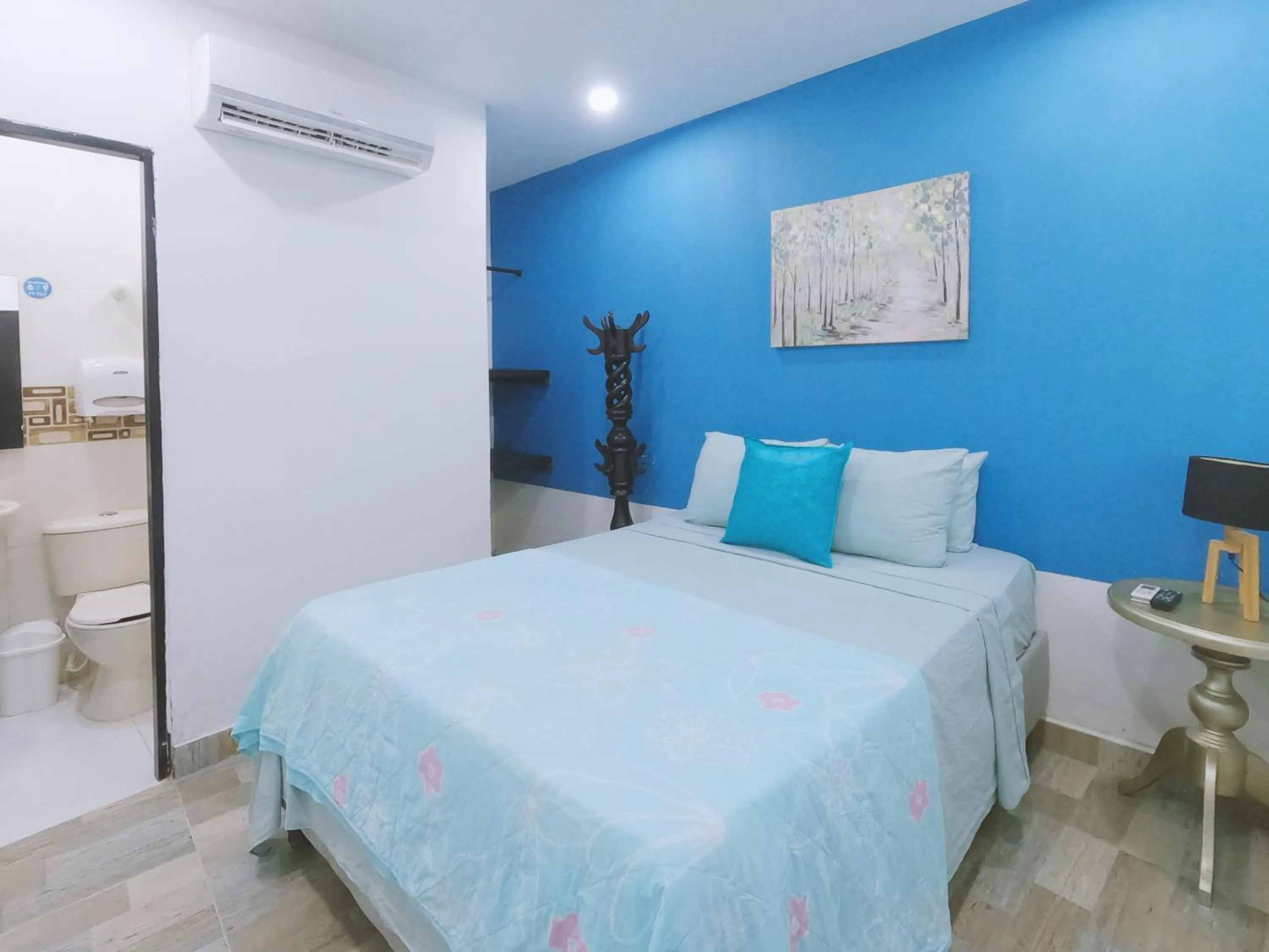 Bed in Hotel Sunset Beach