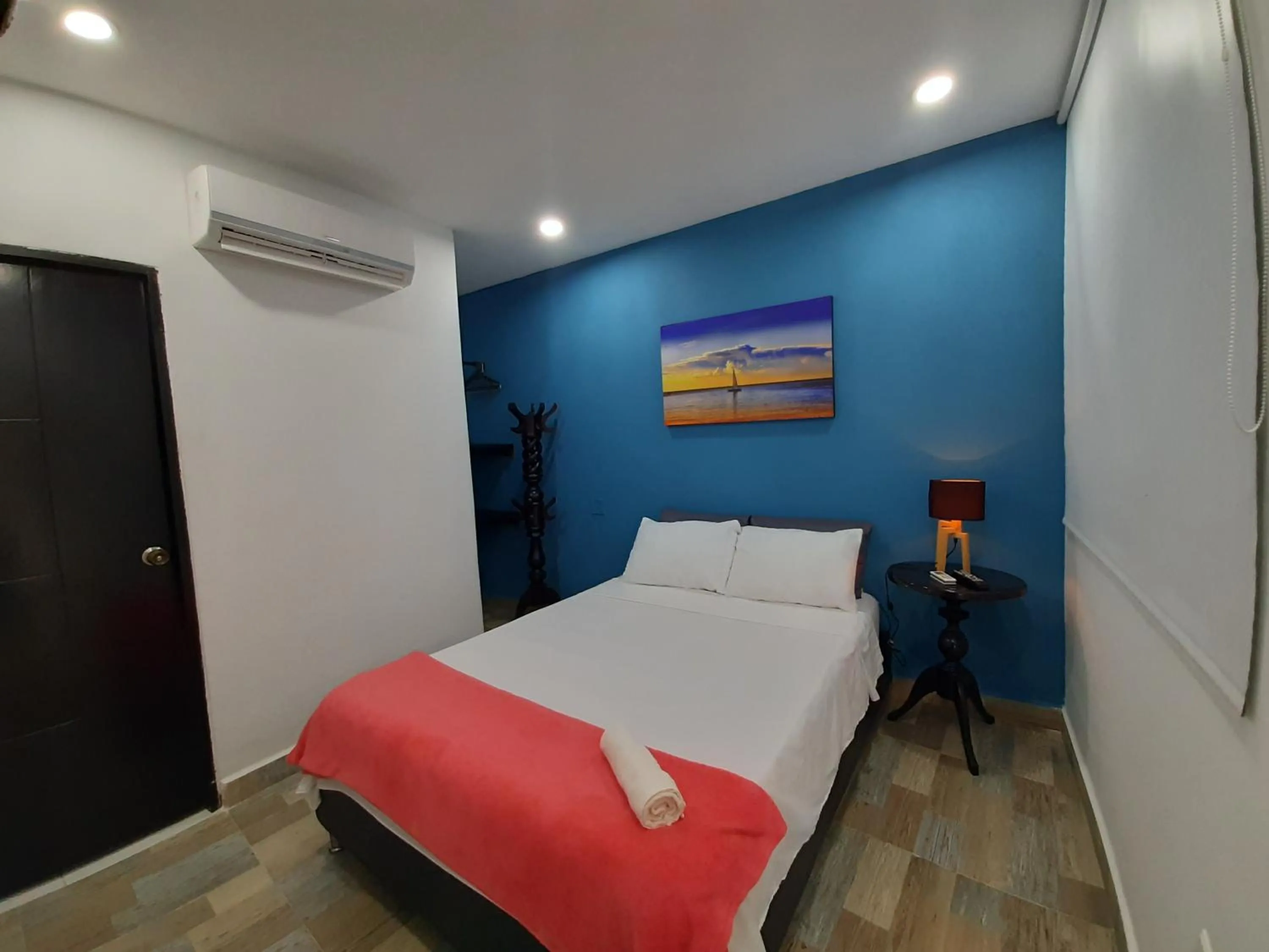 Bed in Hotel Sunset Beach