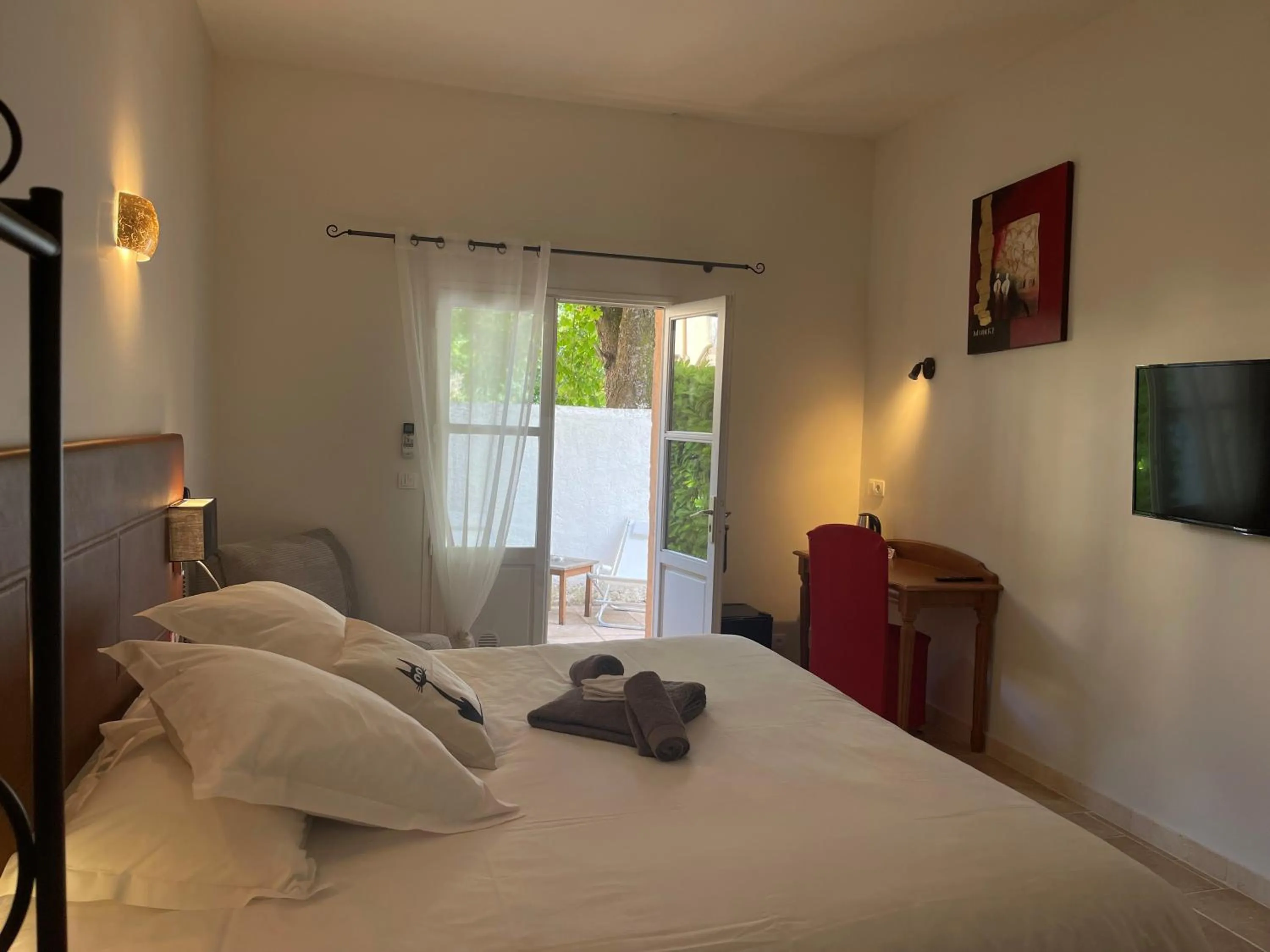 Balcony/Terrace, Bed in Logis Hotel Restaurant Le Domaine de la Régalière