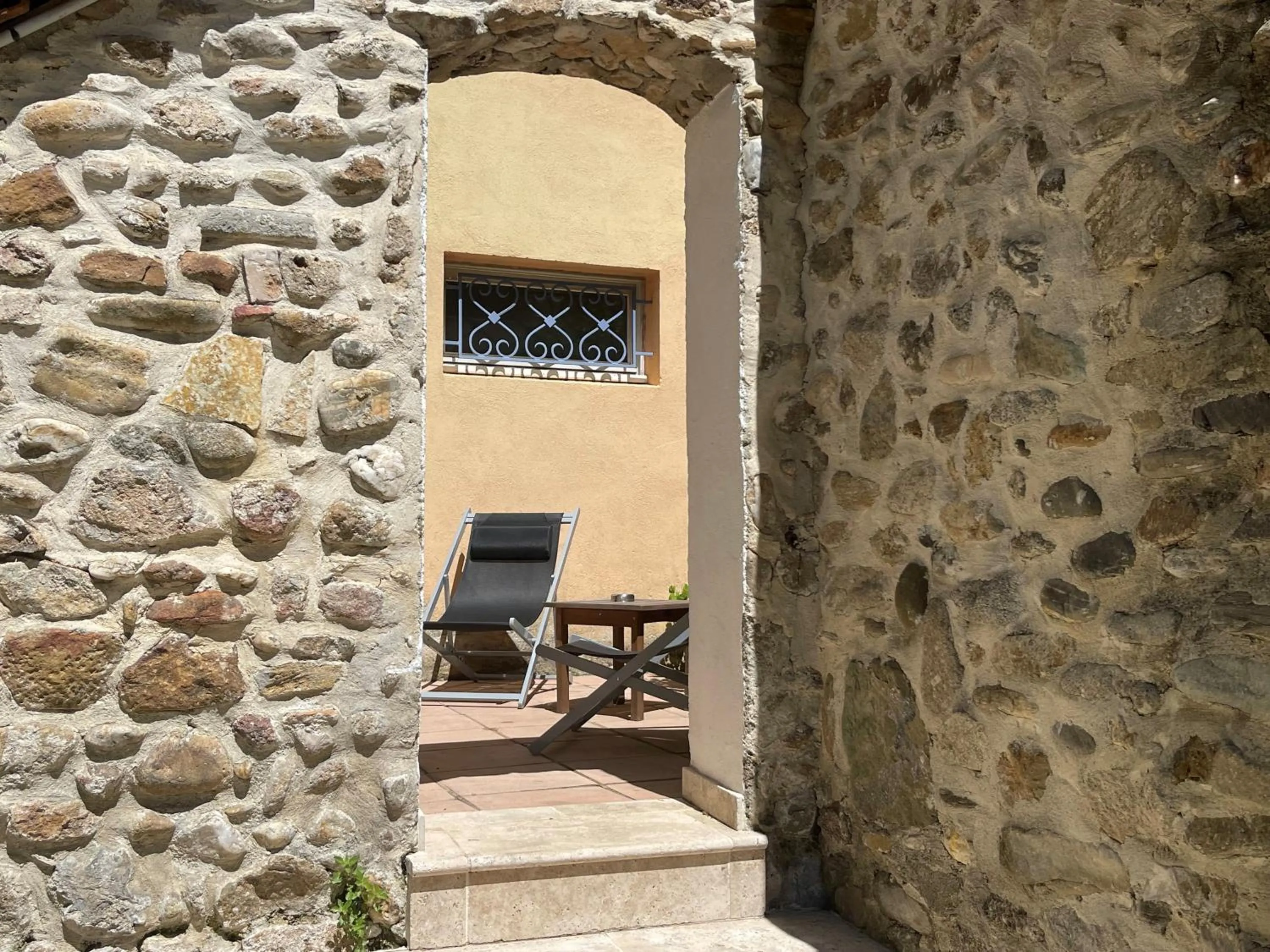 Patio in Logis Hotel Restaurant Le Domaine de la Régalière