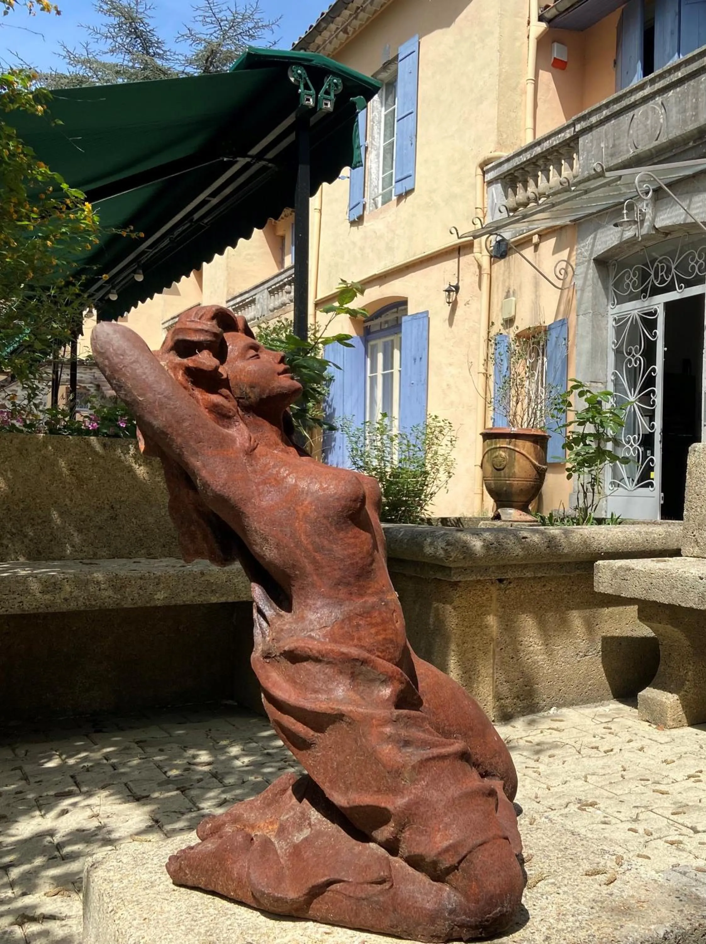 Garden in Logis Hotel Restaurant Le Domaine de la Régalière