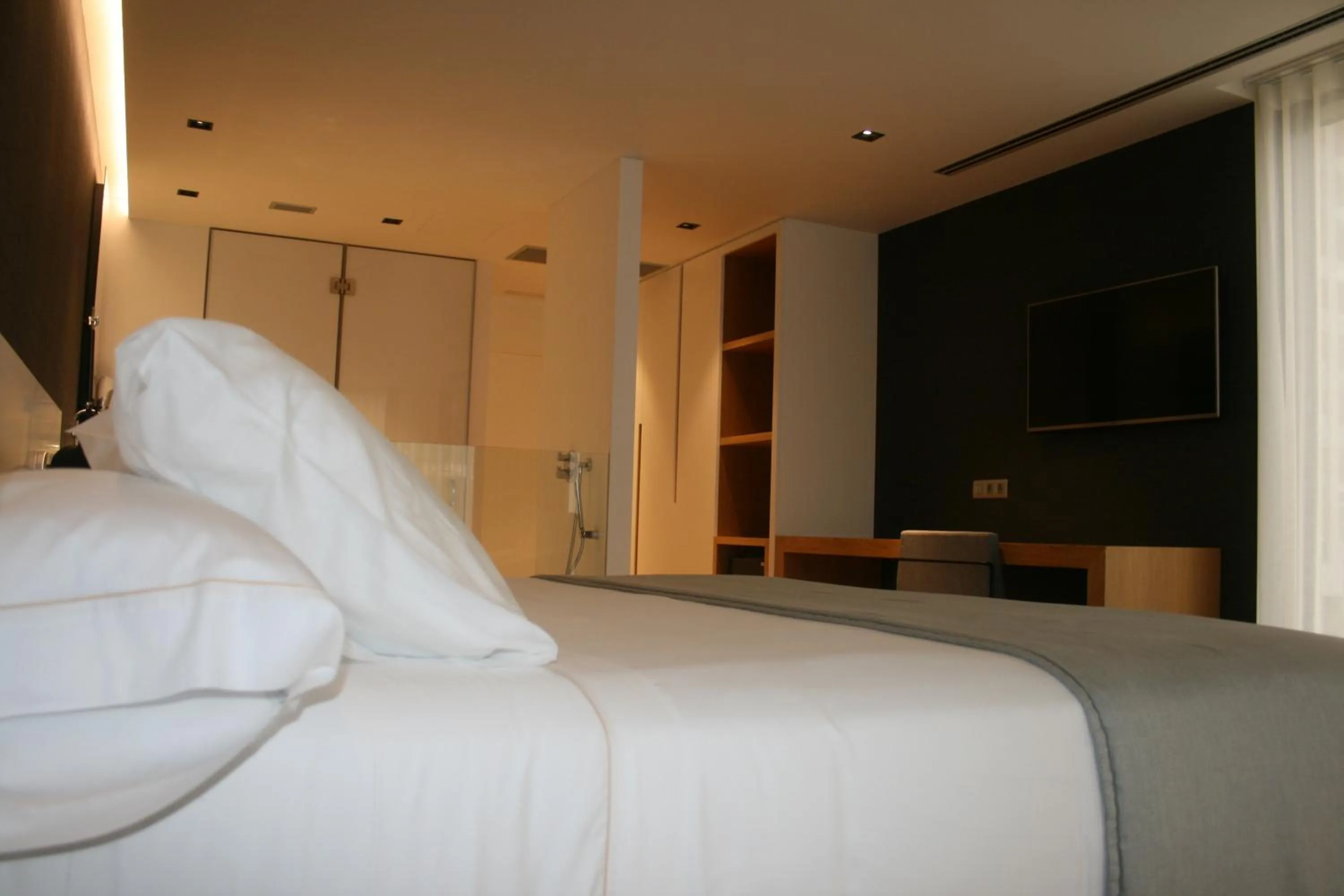 Bed in Hotel U Viveiro