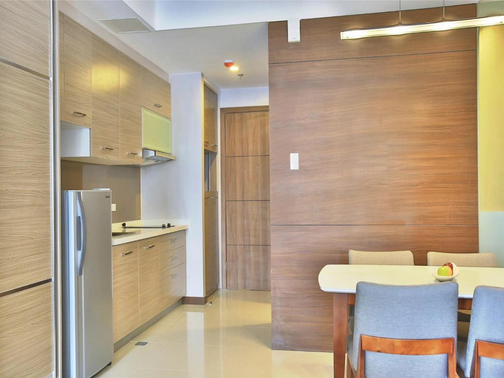 Kitchen or kitchenette in Valero Grand Suites by Swiss-Belhotel