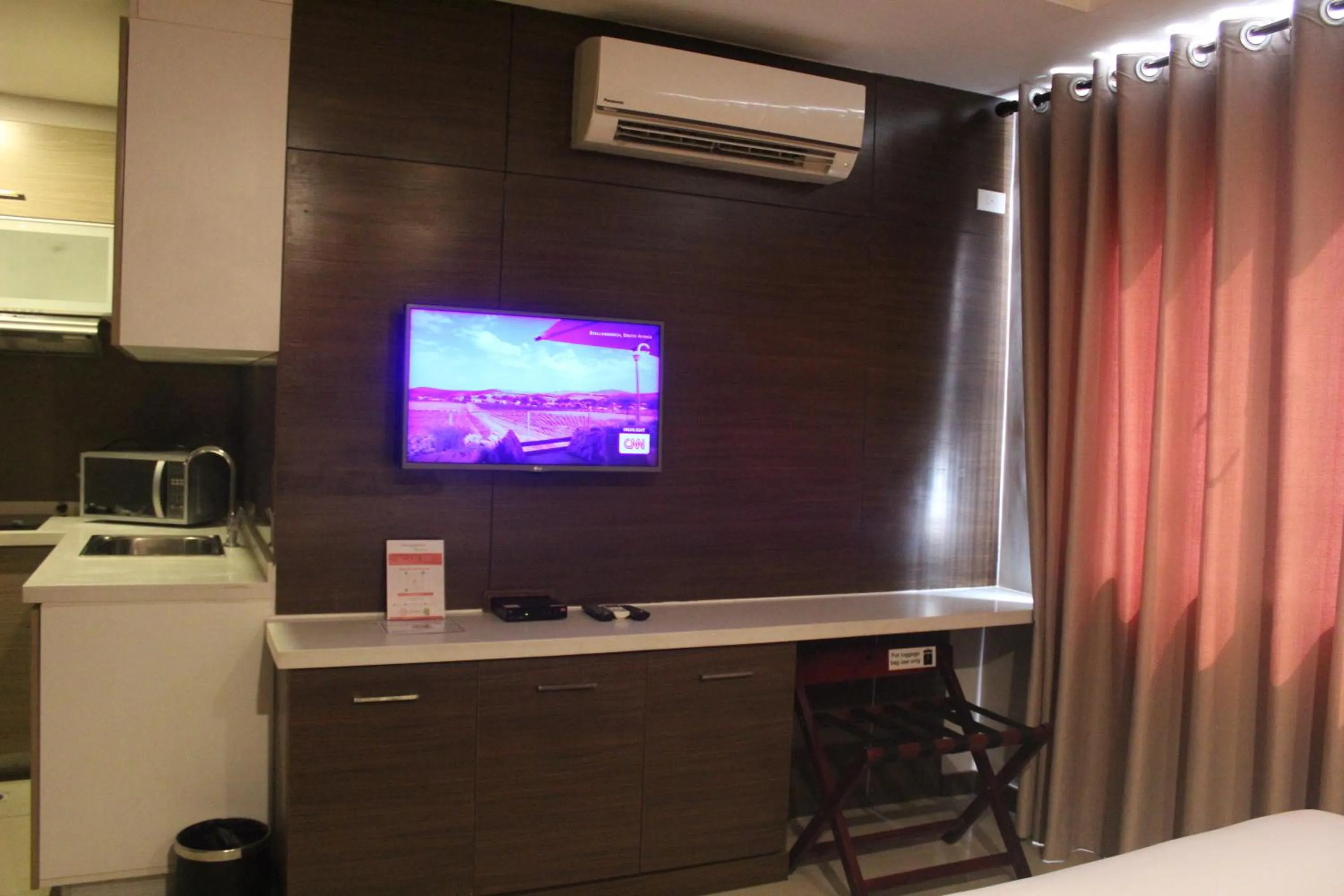 Kitchen or kitchenette in Valero Grand Suites by Swiss-Belhotel